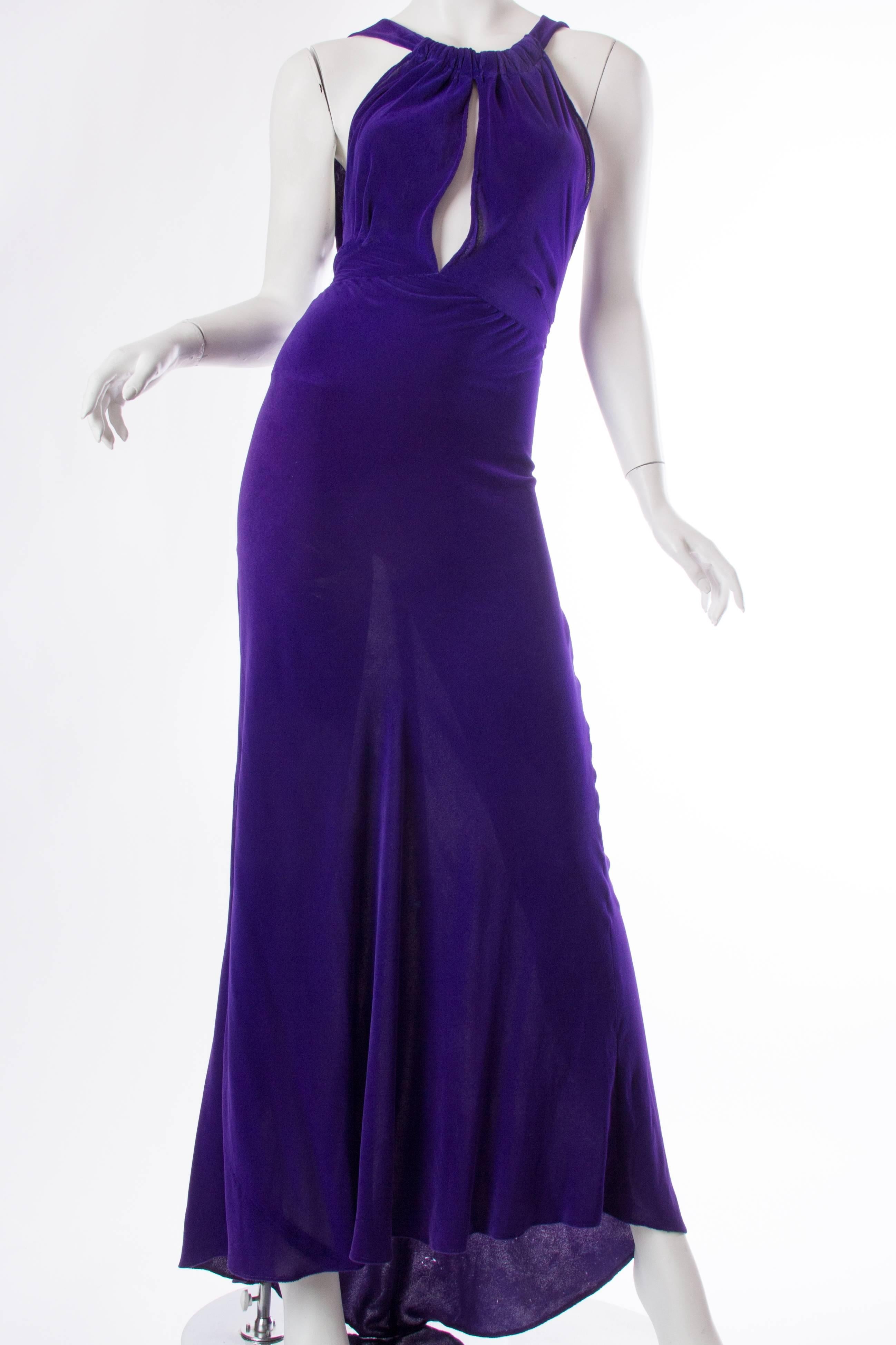Very rare to find a gown of this era which is so revealing whilst maintaining the ageless glamour and old hollywood spirit of the 1930s. Made from luscious silk velvet it drapes and clings to every curve. 