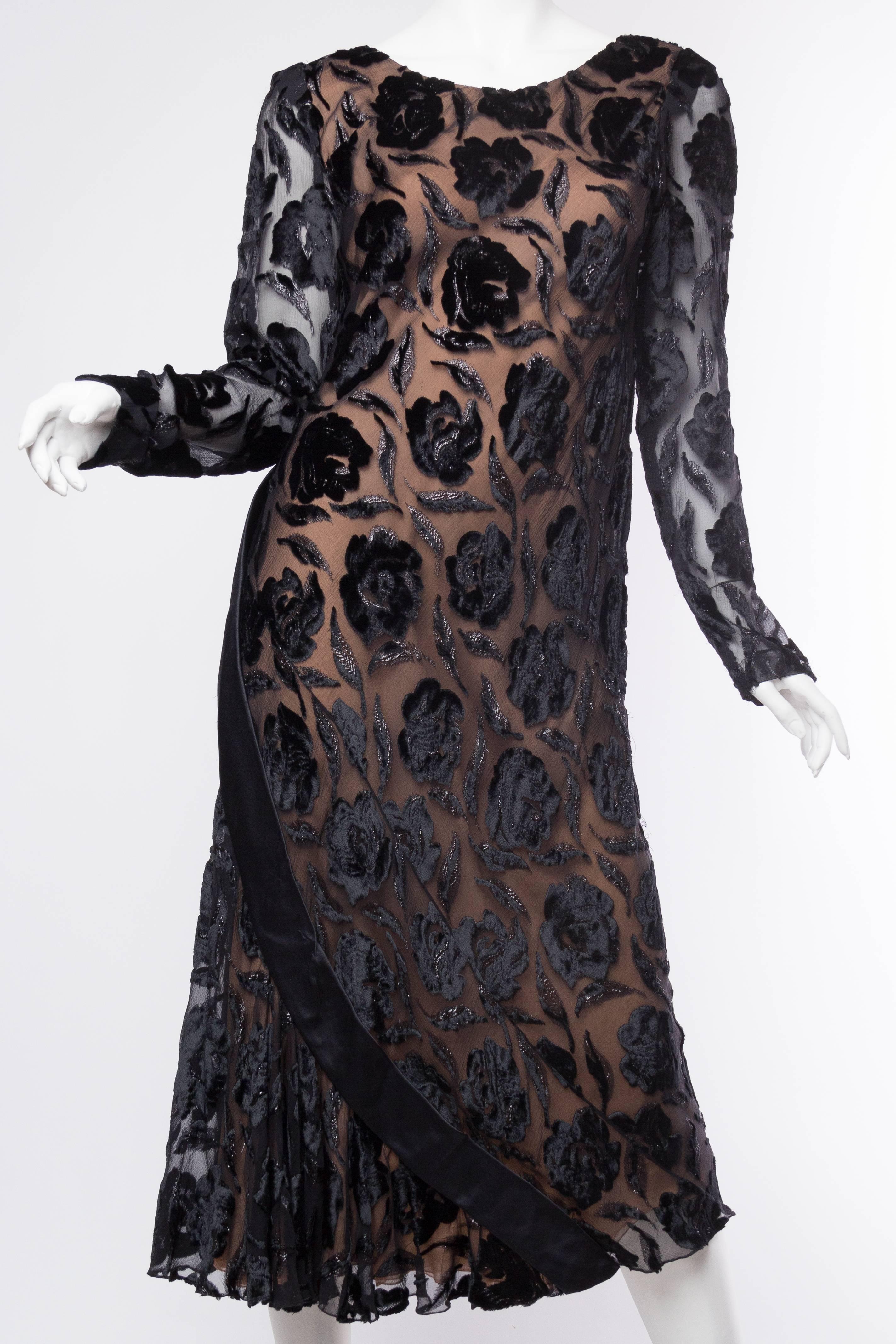 Dress is bias cut and therefore will accommodate several sizes, measurements are measured at the smallest. Beautiful Couture hand finishing throughout. 1970S STAVROPOULOS Black Bias Cut Silk Lurex Burnout Velvet Cocktail Dress With Sleeves 