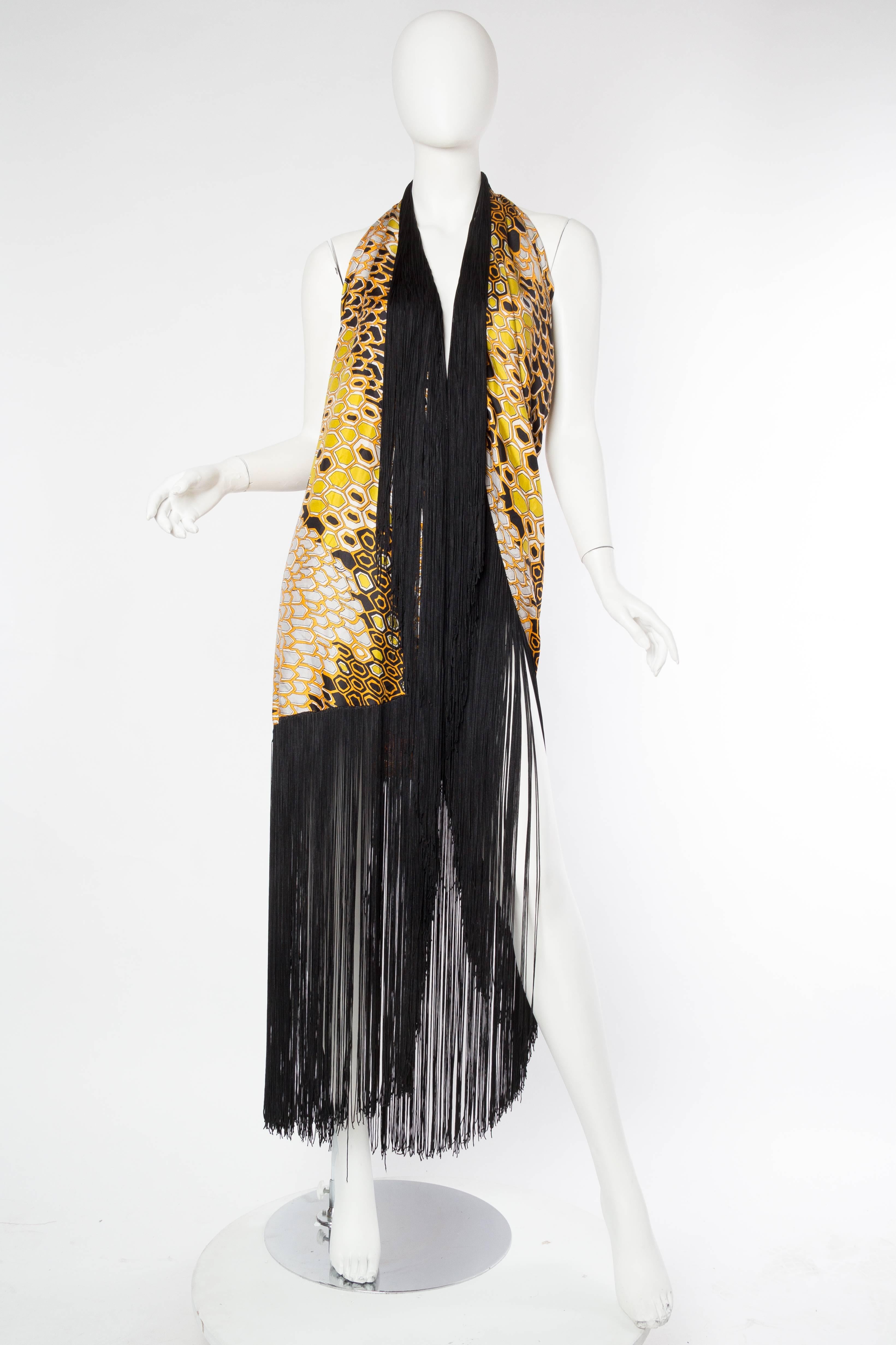 We don't know what to call this beautiful asymmetrical piece of silk other than fabulous. 