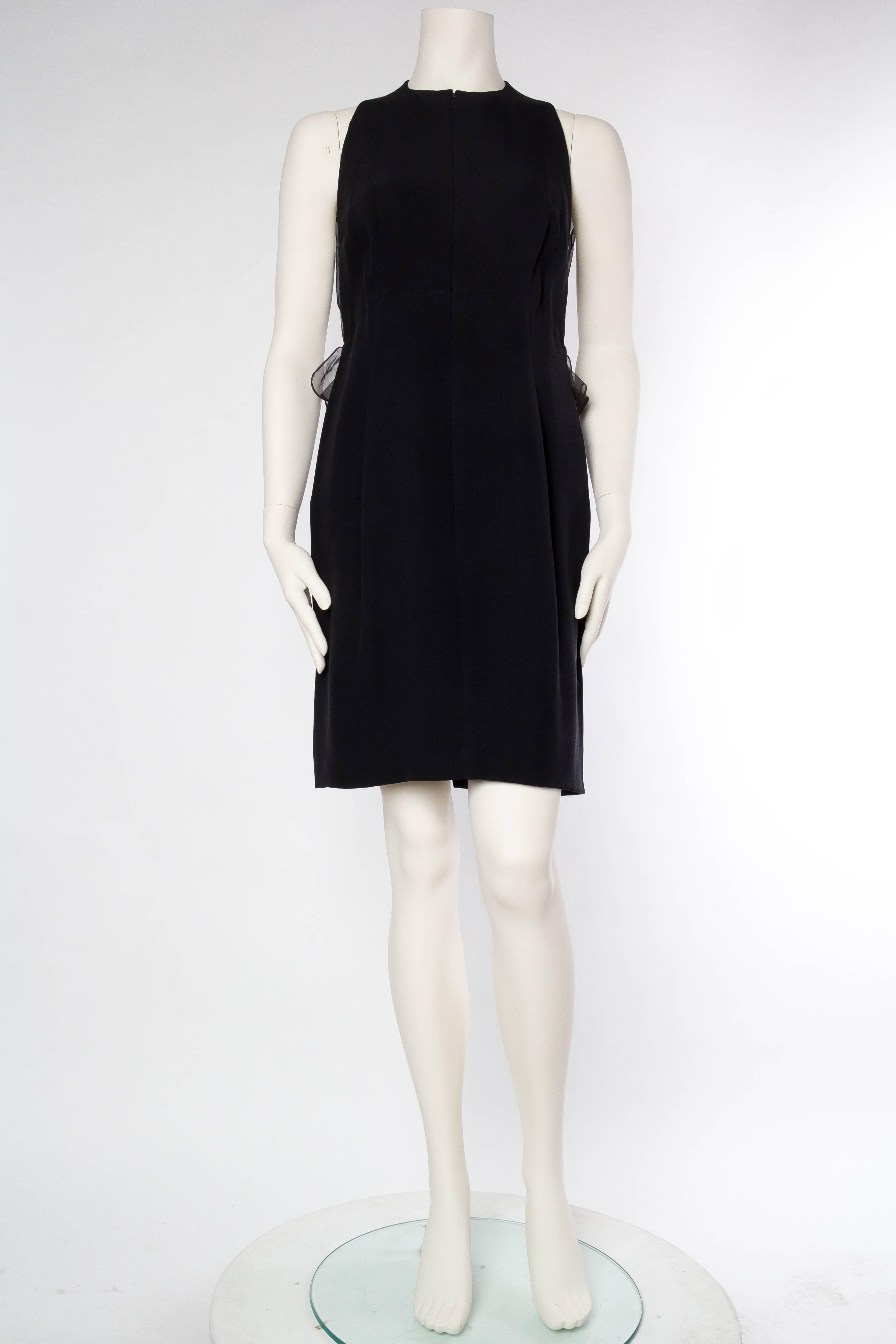 From the designer nobody knows but everyone knocks off, beautiful, interesting, classic lbd.
