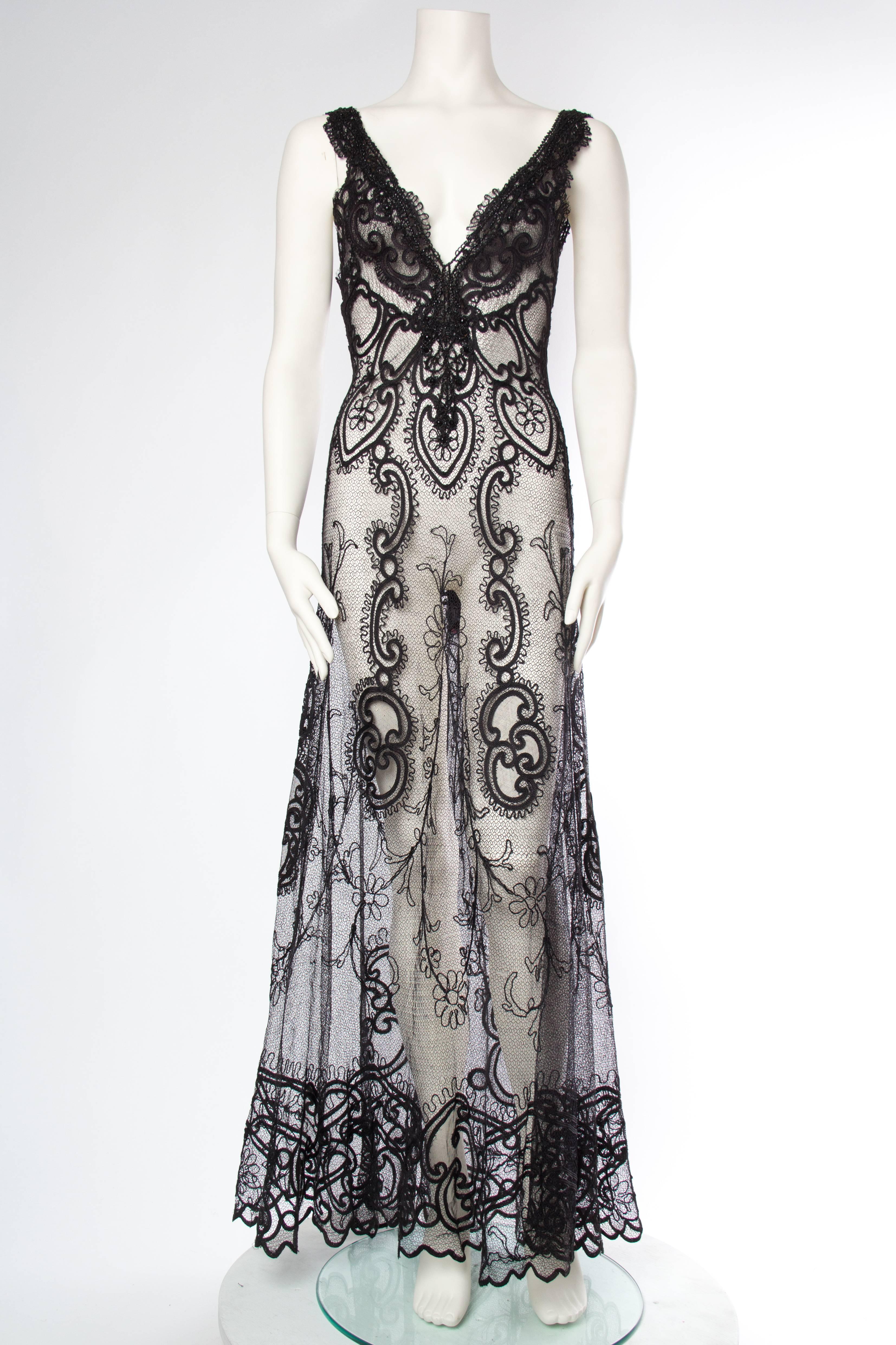 Please note Gown has been re-built. The lace is in phenomenal, wearable, antique condition.  