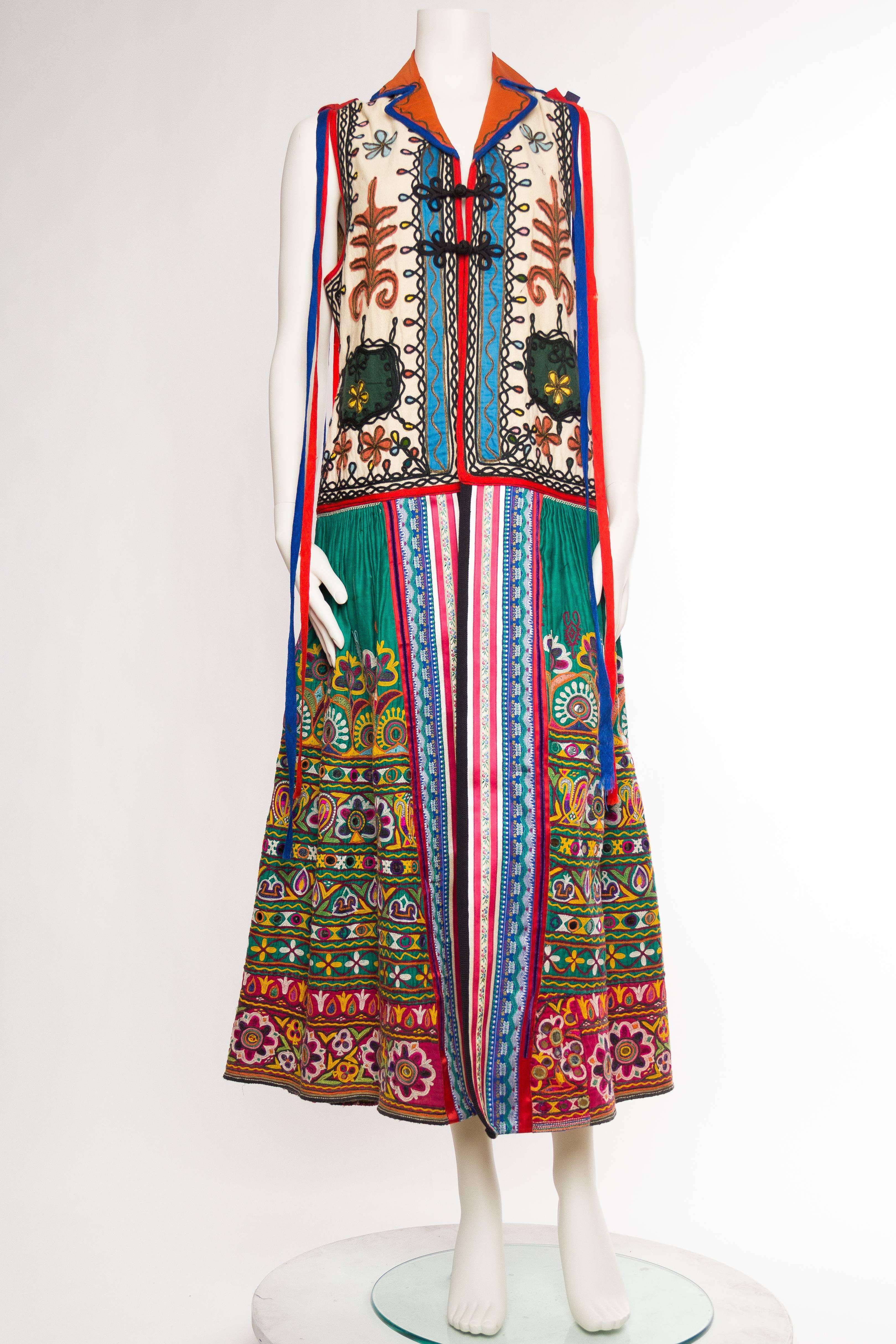 Maxi-vest style made from an eastern european vest which is about 100 years old and a slightly newer skirt which is Indian in origin. 