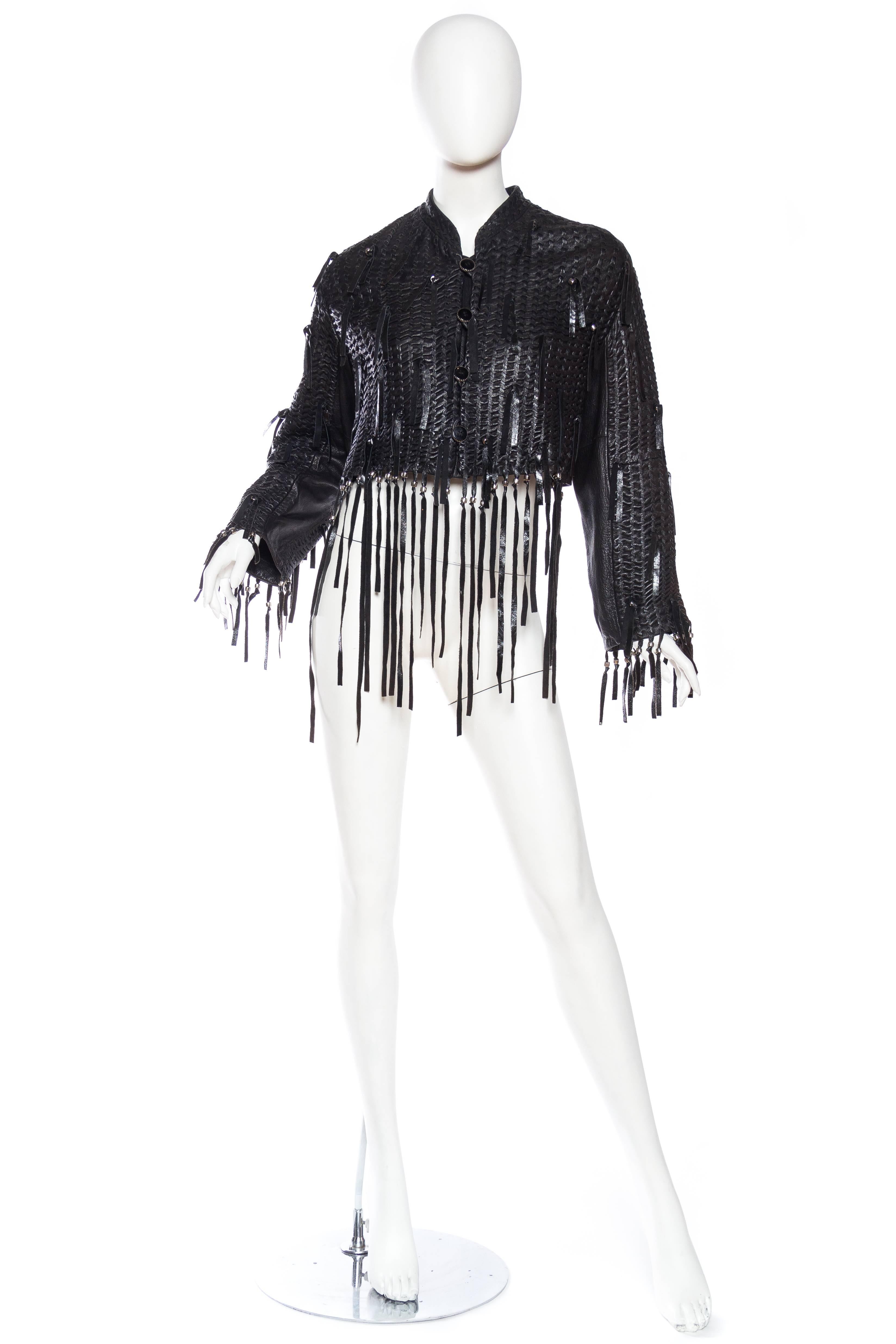 Issey Miyake Fringed Leather Jacket made from butter soft leather which has been entirely embroidered upon itself with leather, a beautiful work of art. 
