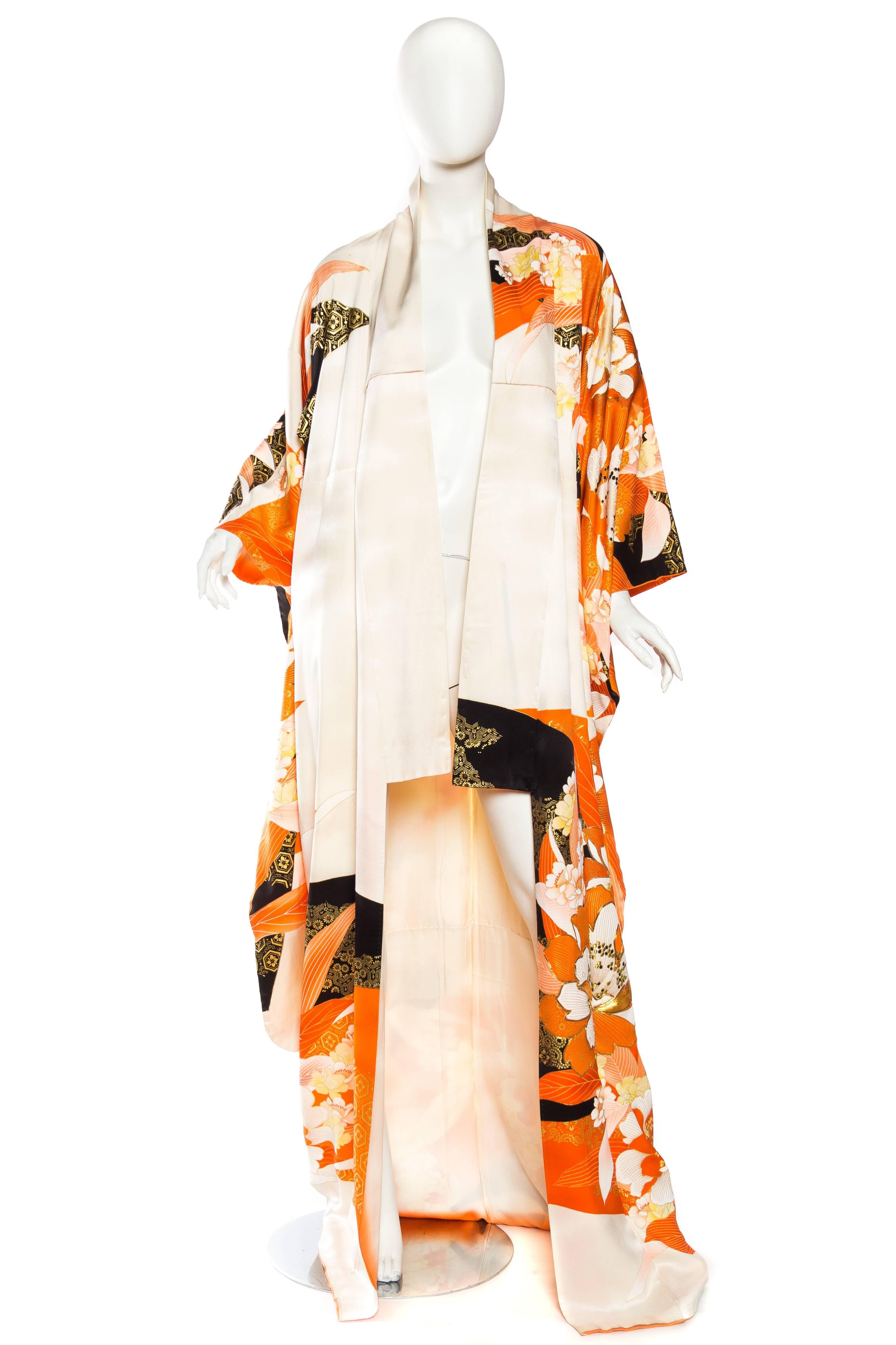 Late Mid-Century Hand Painted and Printed Japanese Kimono in wonderful metallic golden tones set off with black on the cream ground. 