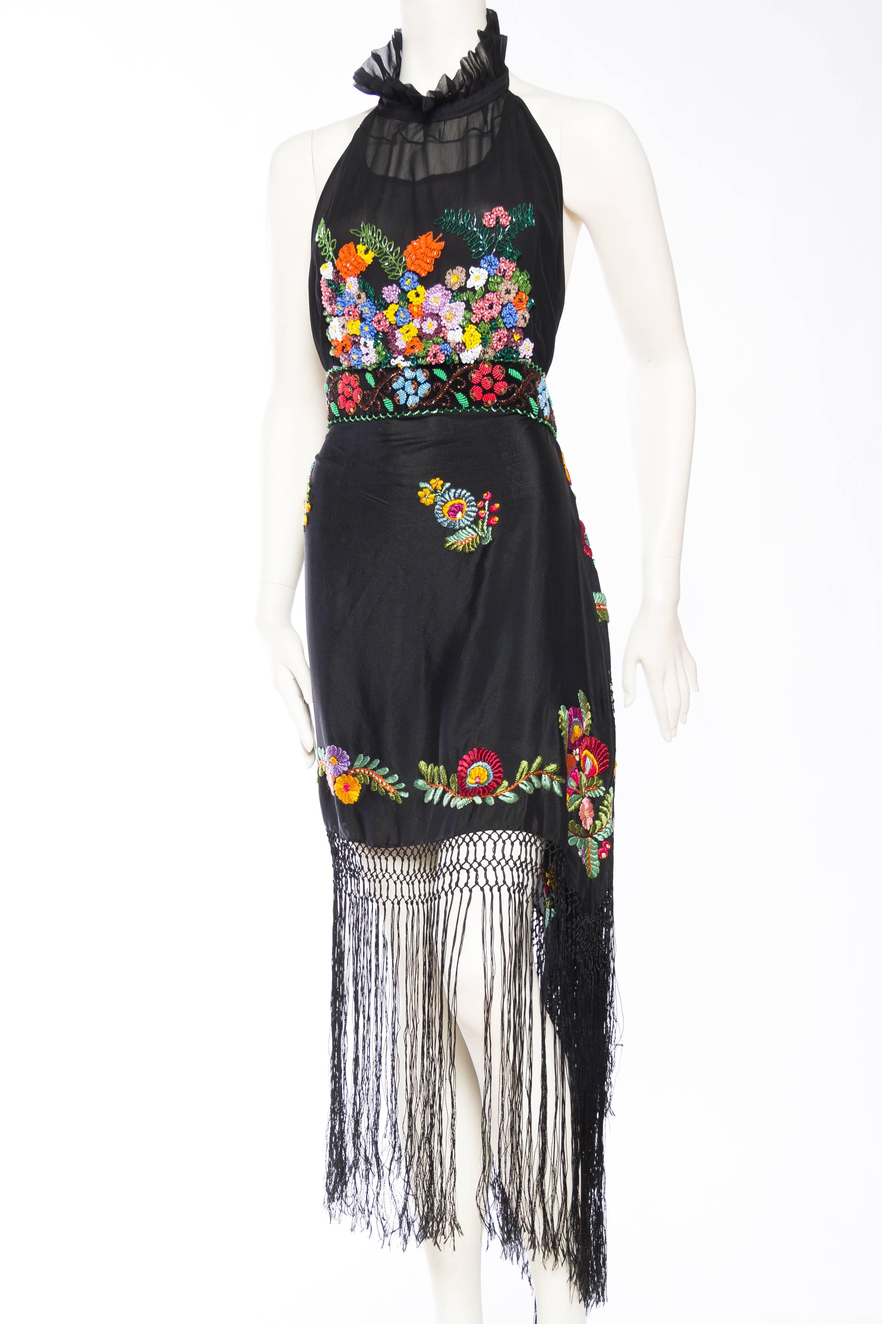 This dress is made from materials mostly dating to the 1920s. 