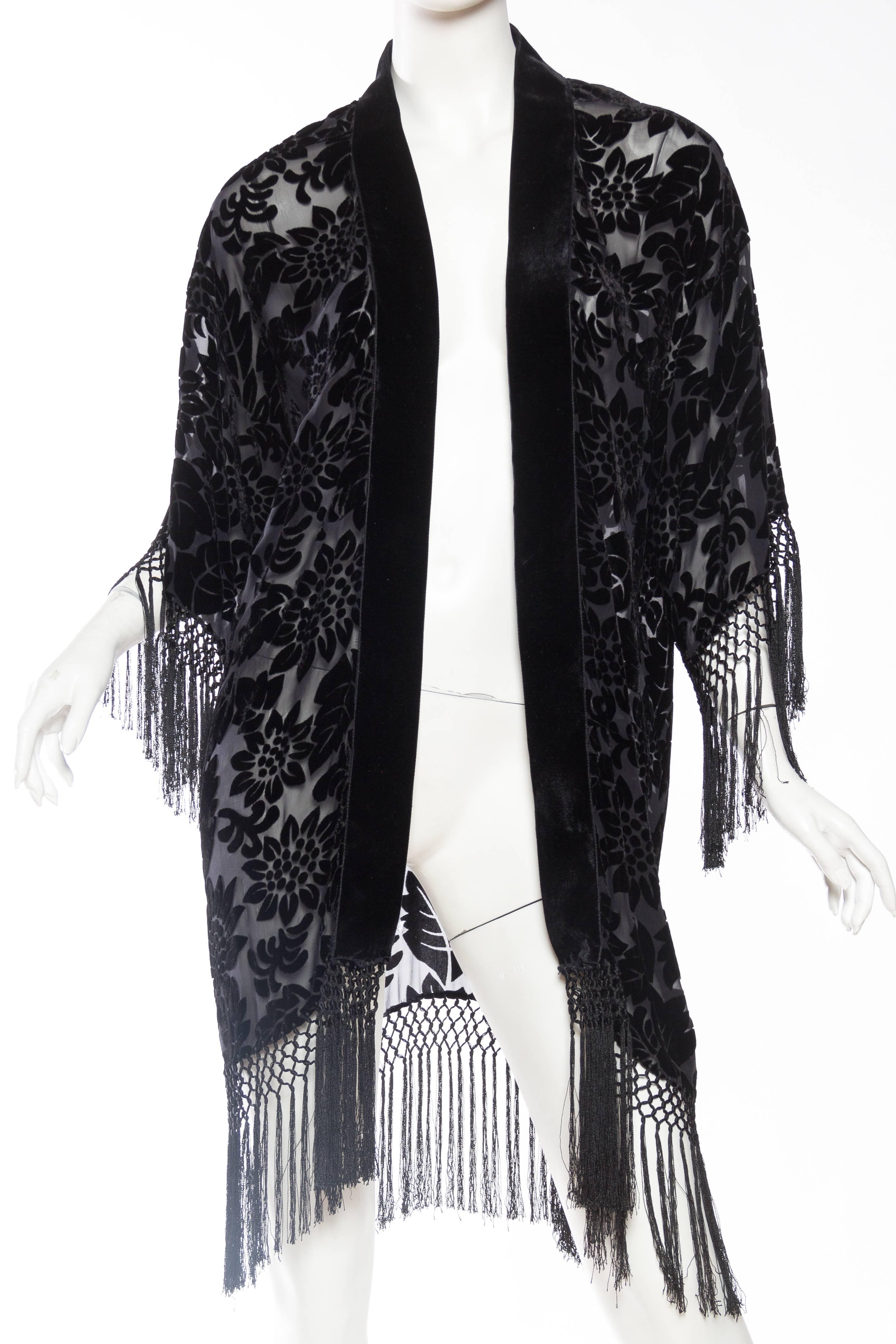 MORPHEW COLLECTION Black Floral Silk Burnout Velvet Sheer Fringed  Kimono
MORPHEW COLLECTION is made entirely by hand in our NYC Ateliér of rare antique materials sourced from around the globe. Our sustainable vintage materials represent over a