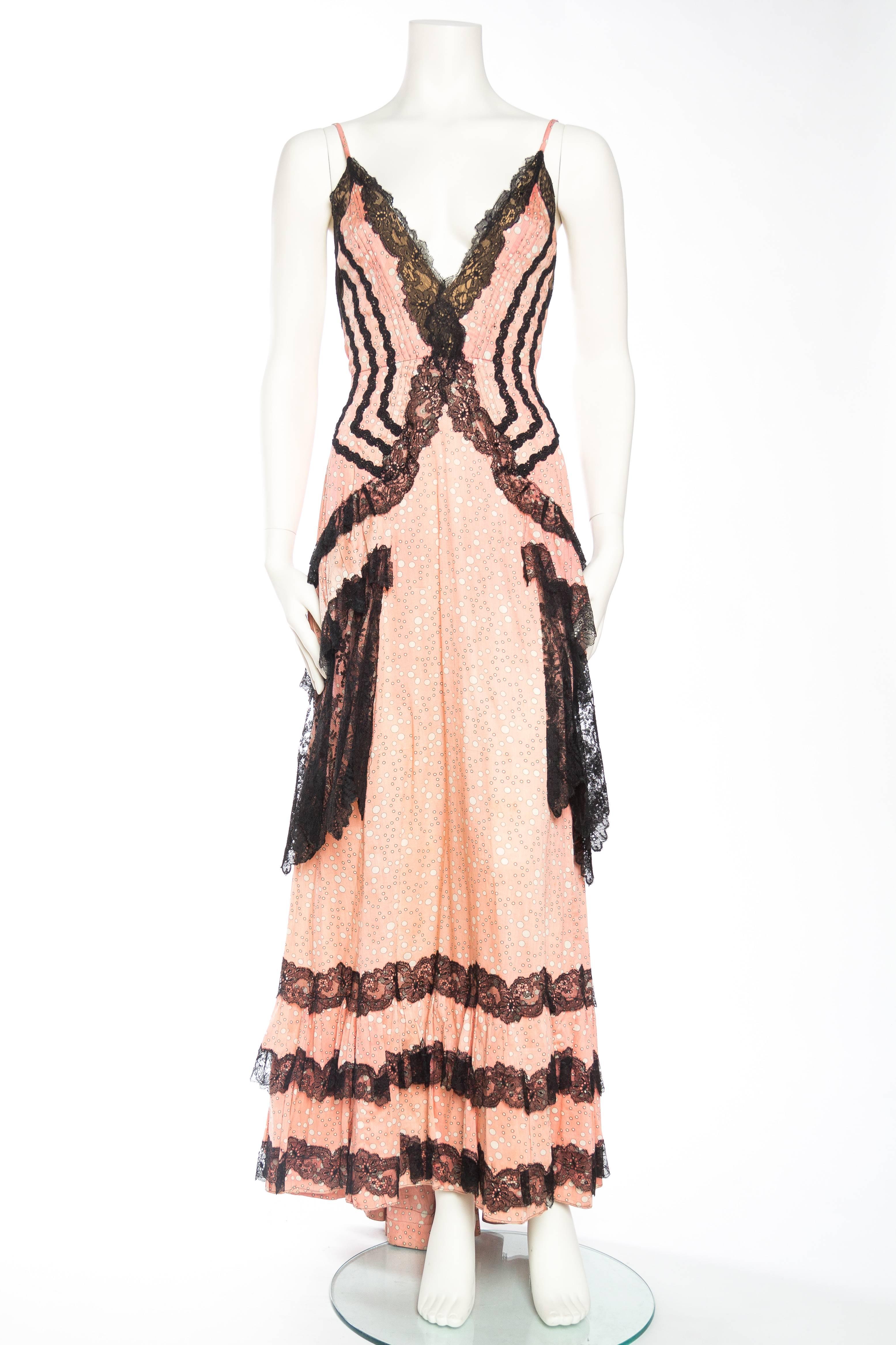 Reworked from an original 1890s ensemble this dress has the romance of the past with a sexy modern cut. 