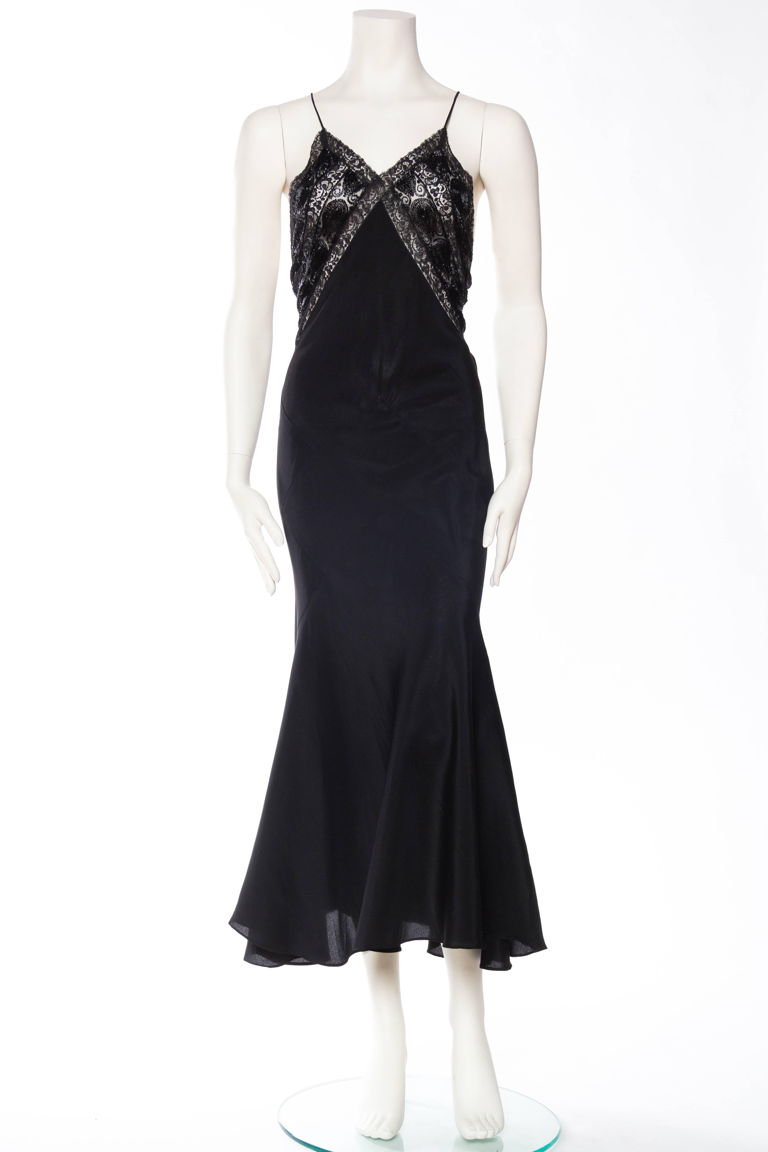 This gown is made from a recycled 1930s bias cut gown. The bodice is entirely new made in our NYC atelier using antique Edwardian beaded lace. MORPHEW COLLECTION Black Bias Cut Silk Crepe De Chine Backless Gown With Edwardian Beaded Lace 
MORPHEW