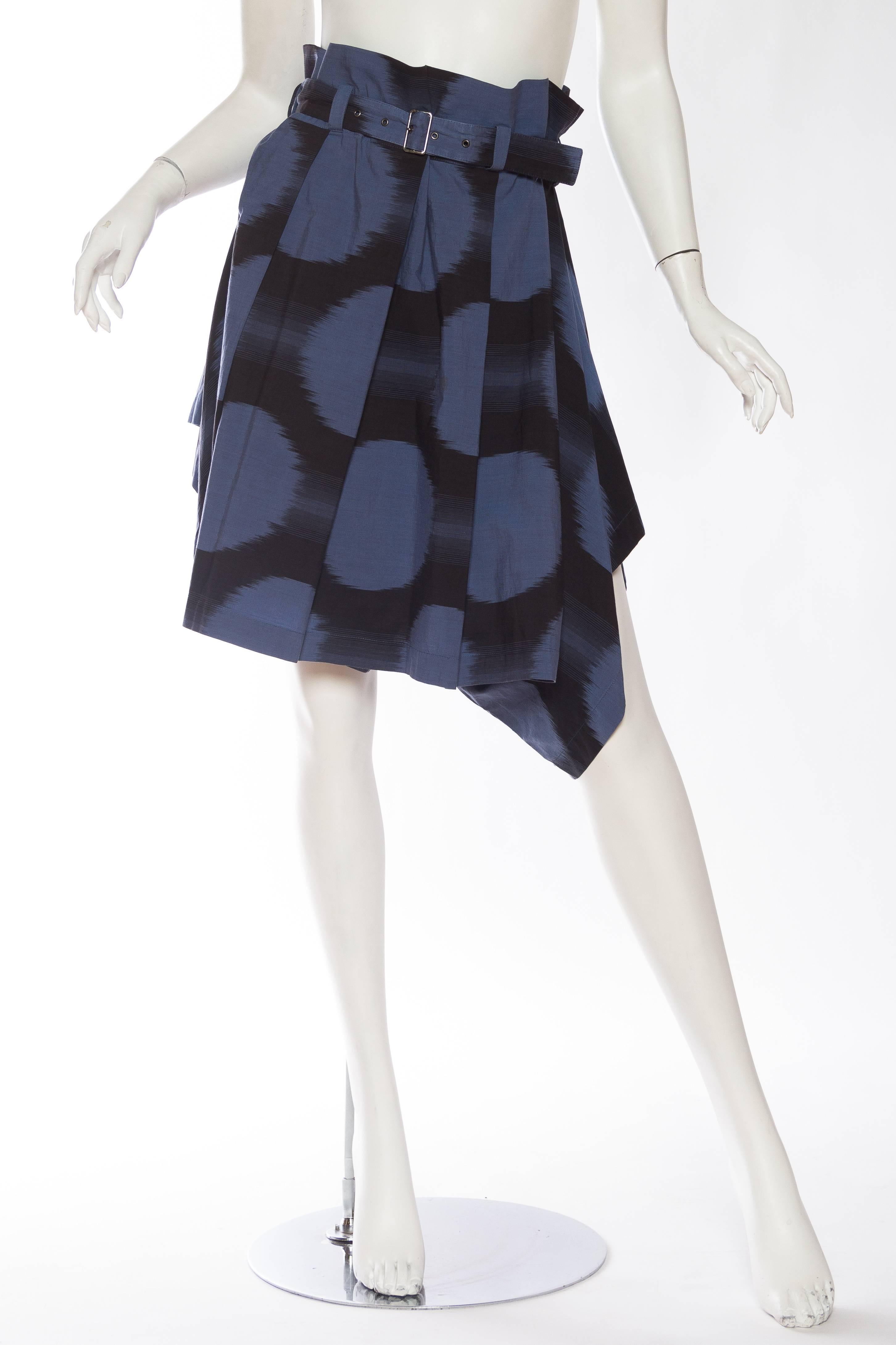 This piece can be worn both as a skirt and as shorts. Also looks cool over a heavy sweater belted high. Beautiful Ikat cotton. Bergdorf Goodman label