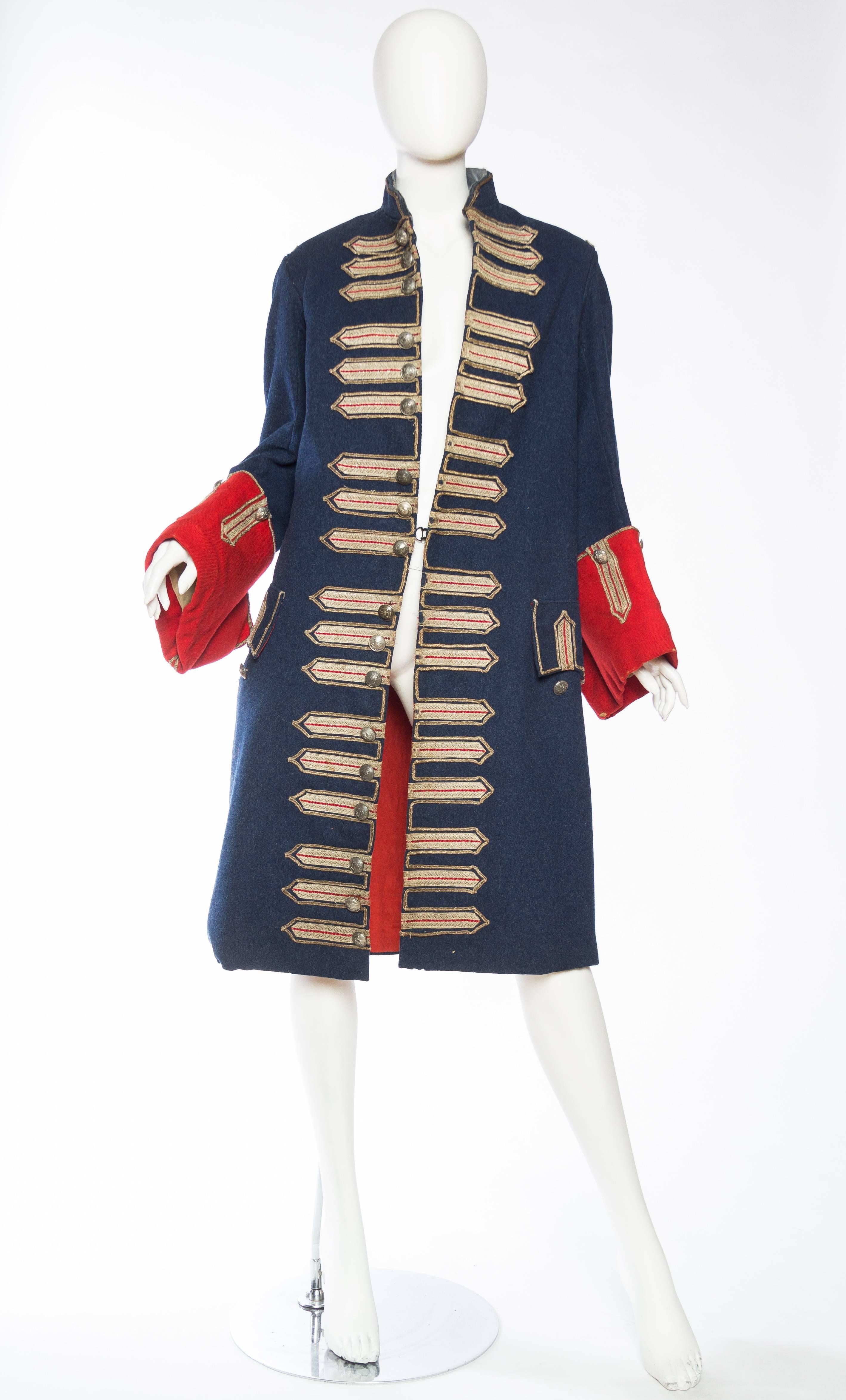 The materials of this coat date it to the latter half of the 19th century. The style however dates to the early to mid 18th century. Wonderfully detailed and made by hand, fully lined in cotton and detailed with real silver braid and official