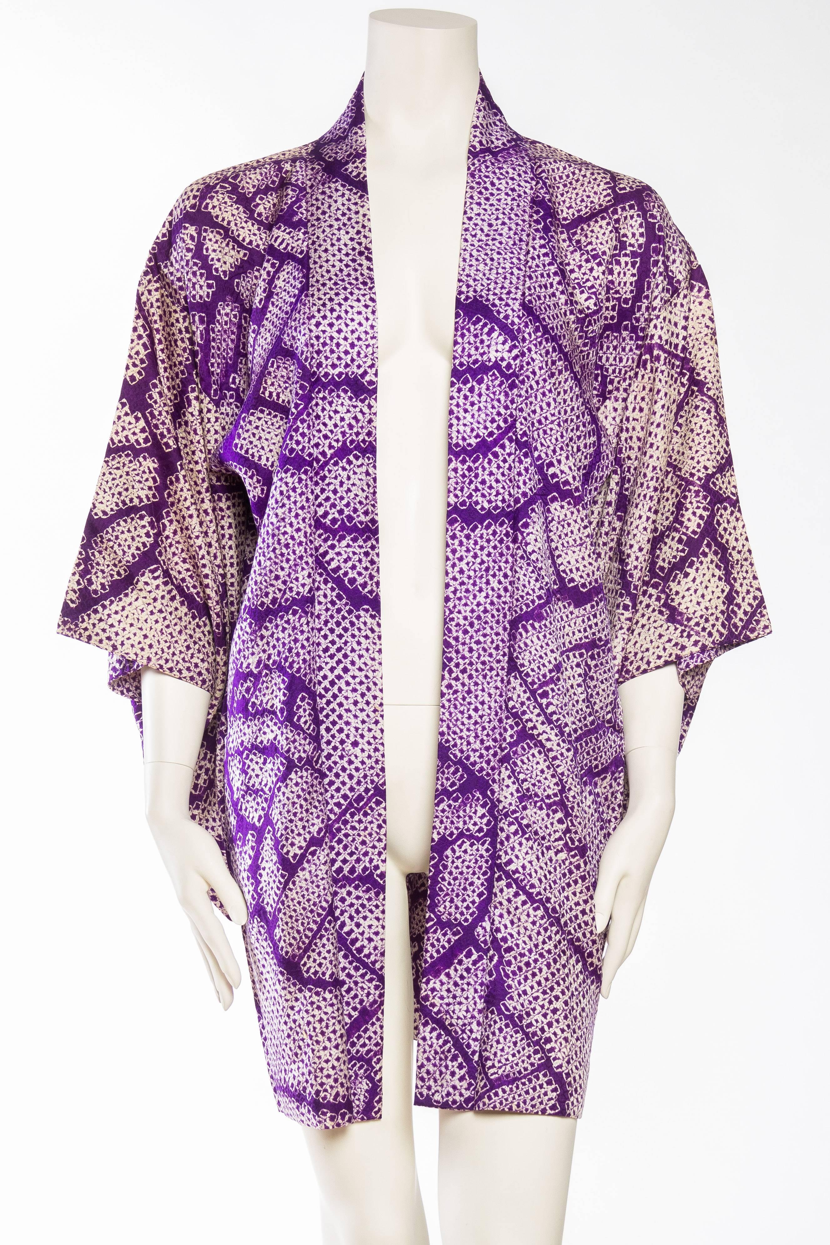 Beautiful hand work to the Shibori dying of this kimono silk in a pattern of playful  rice paper lanterns.