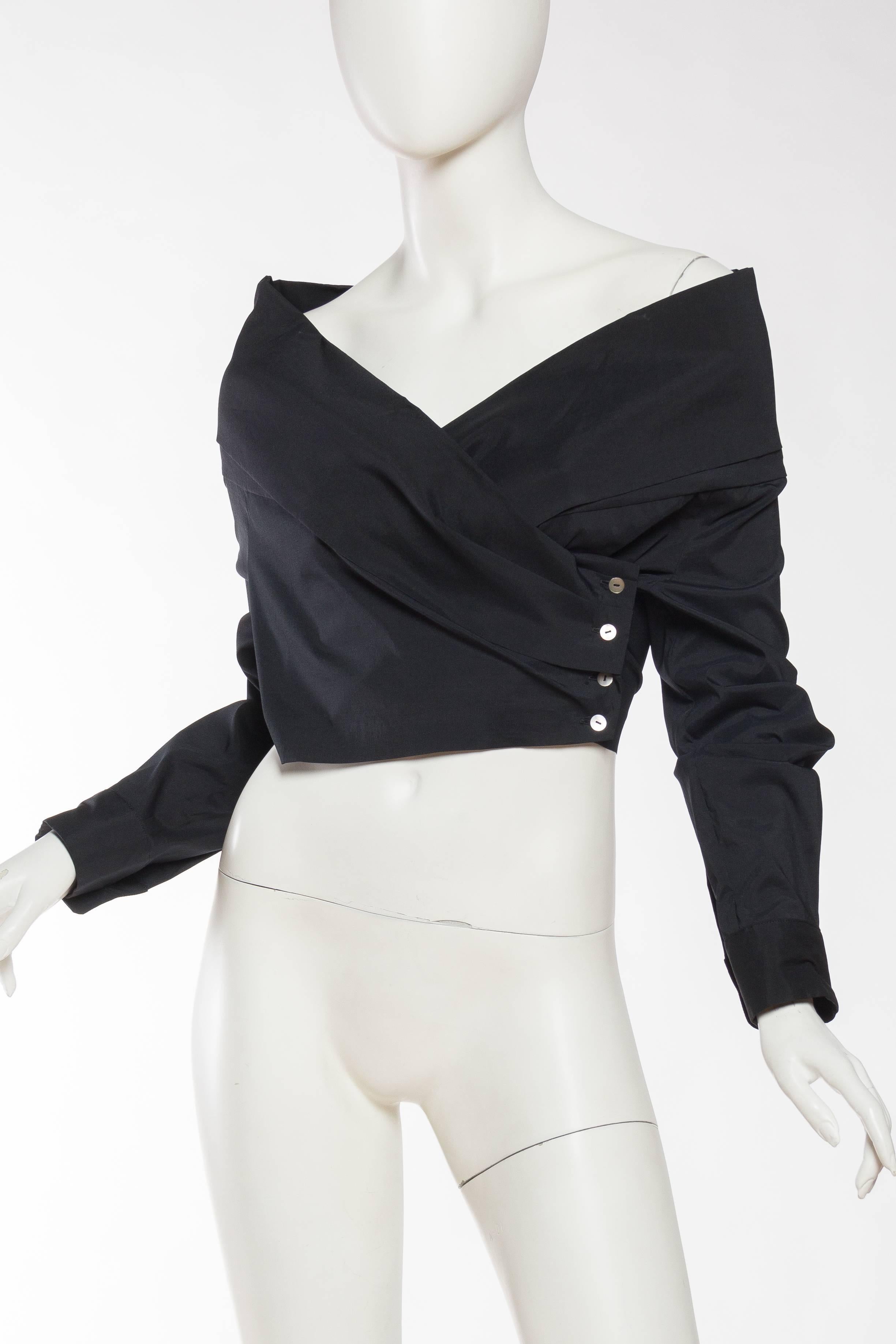 Iconic yet terribly hard to find 1990s off the shoulder picture blouse, stretch cotton wraps and buttons on the side. 