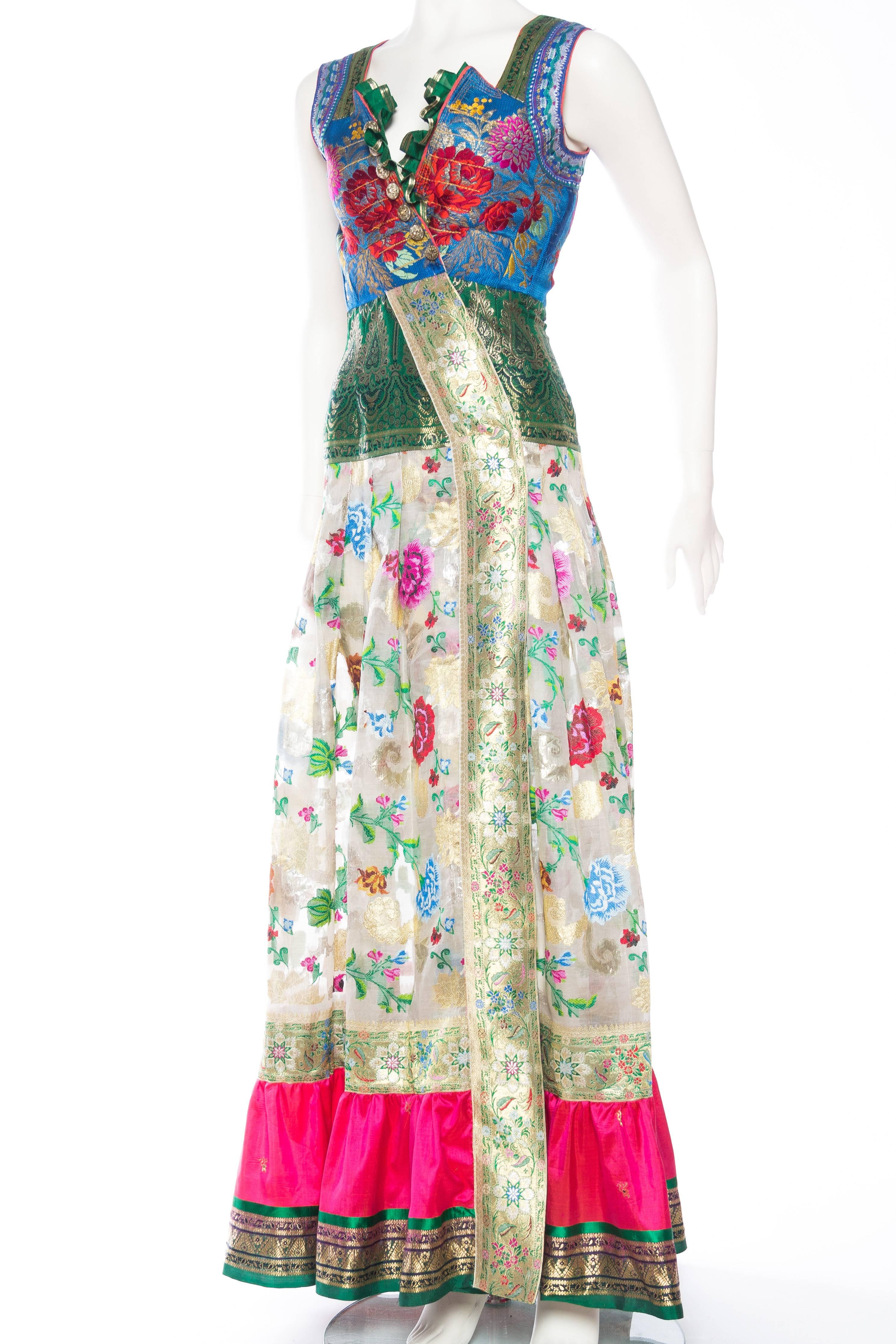 Dress made from Antique Folk and Indian Silks with Metallics. Piece can be worn open as a dramatic tunic vest as well. 