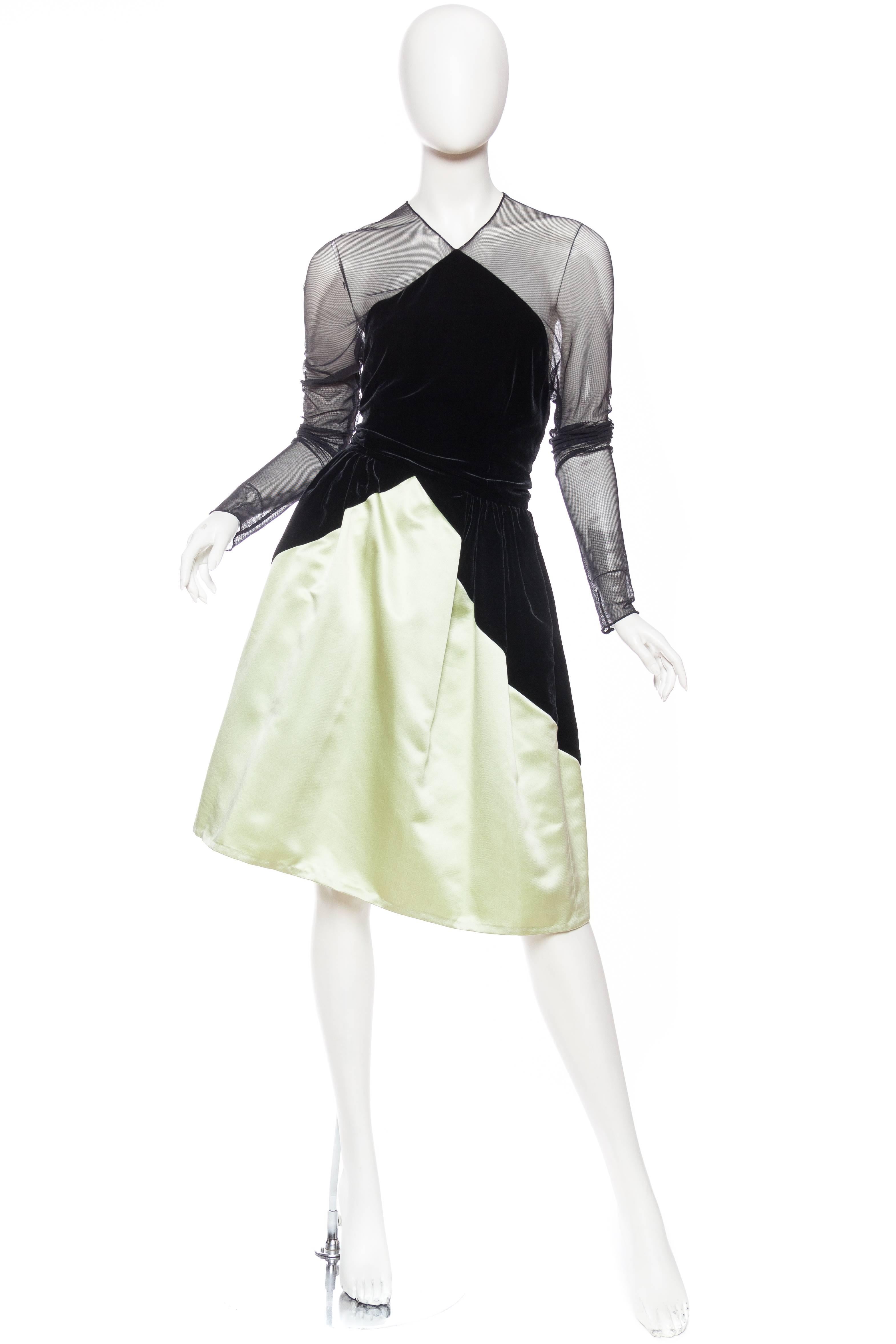 We were surprised to see the Bill Blass label in this dress. The lines and mix of textiles are just so Geoffrey Beene he must have been influenced by him in the 1990s, that or Charles James's work from the 1950s. Reguardless this is a modern, chic