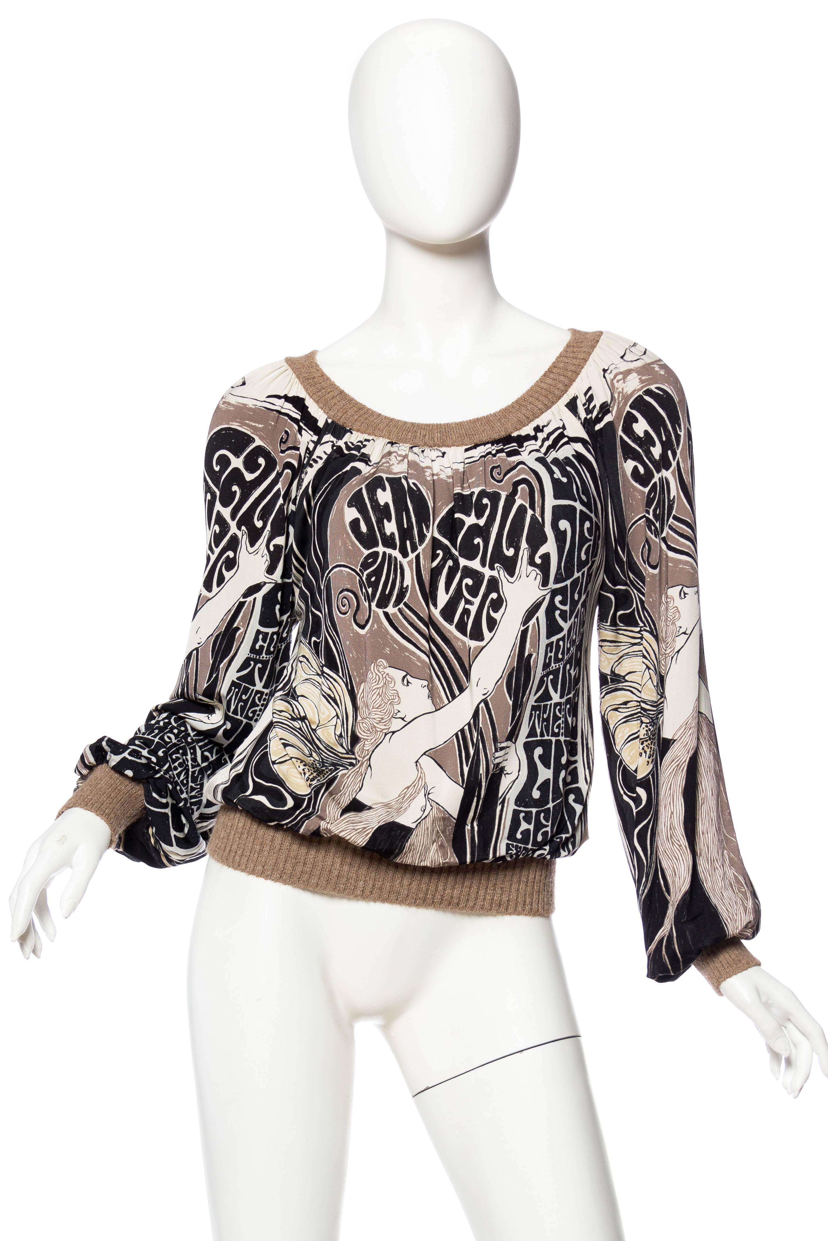 Made from a silky viscose jersey with a sensual Alphonse Mucha inspired woman climbing about Jean Paul Gaultier in Art Nouveau vines. 
