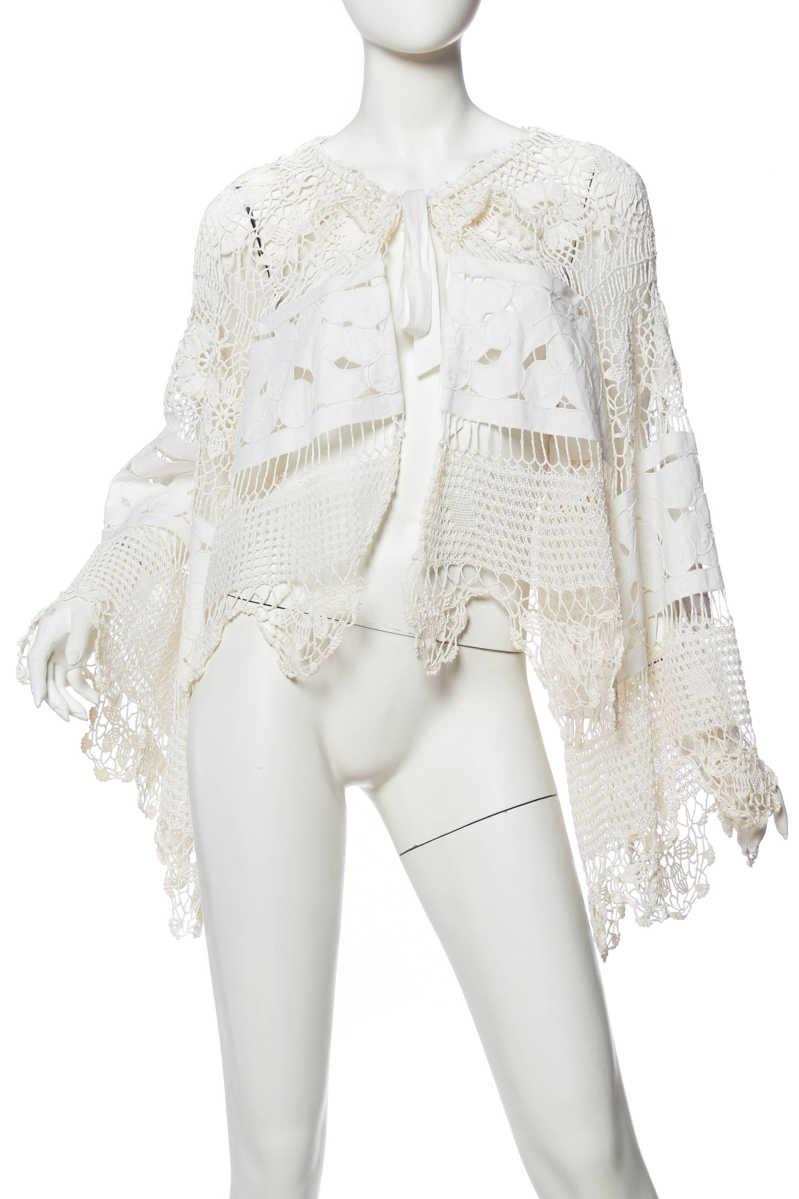 This jacket is made from vintage lace dating to around the 1940s. We built this piece in the style of the hippy era with a 1960s 1970s vibe. Ties at neck with cotton ribbon to adjust for size. 