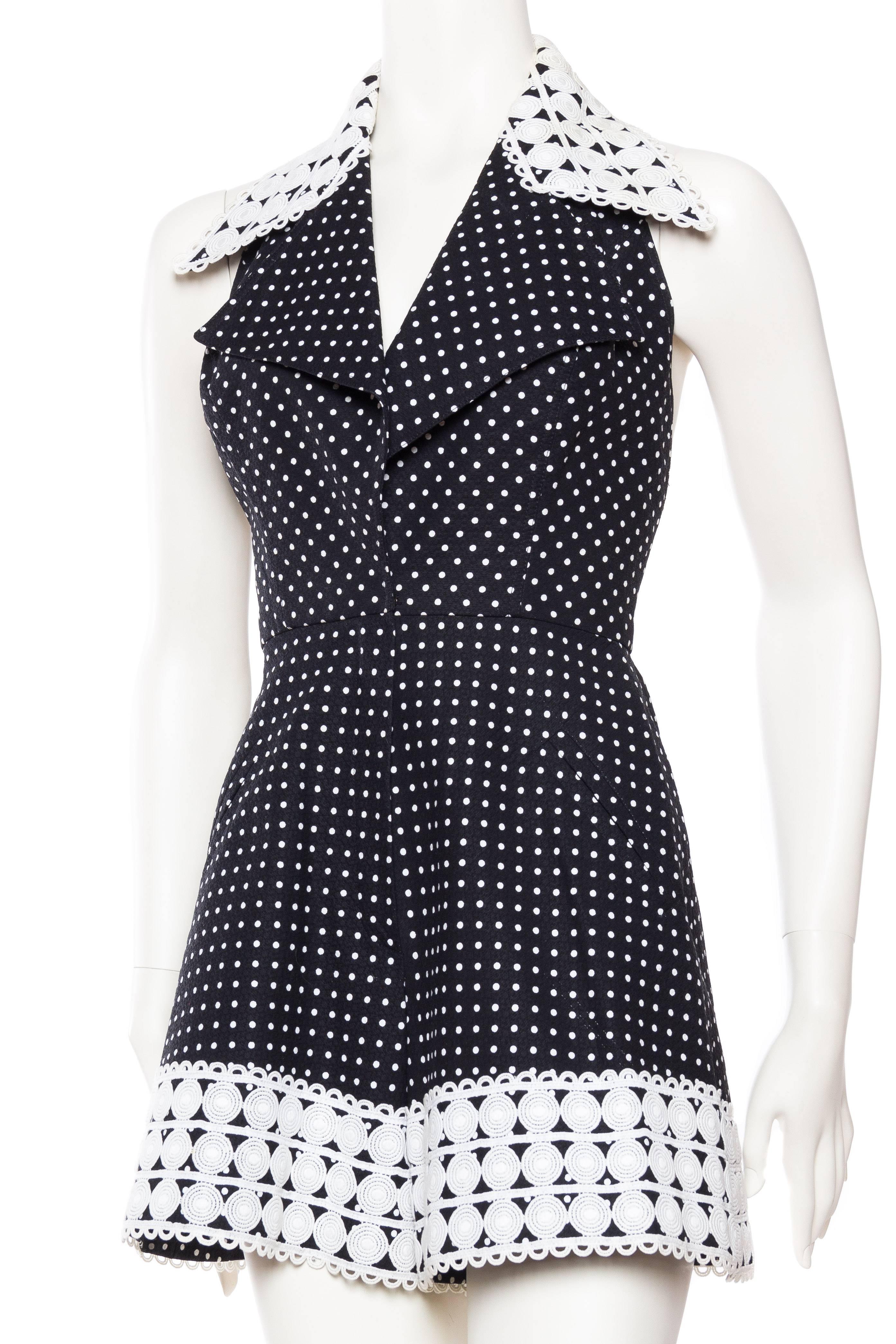 Liliane Romi is one of those many small named French Couture houses which pop up from time to time. Not much is ever known about them however the very fine French craftsmanship always speaks for it's self. This beautifully cut romper is made from a
