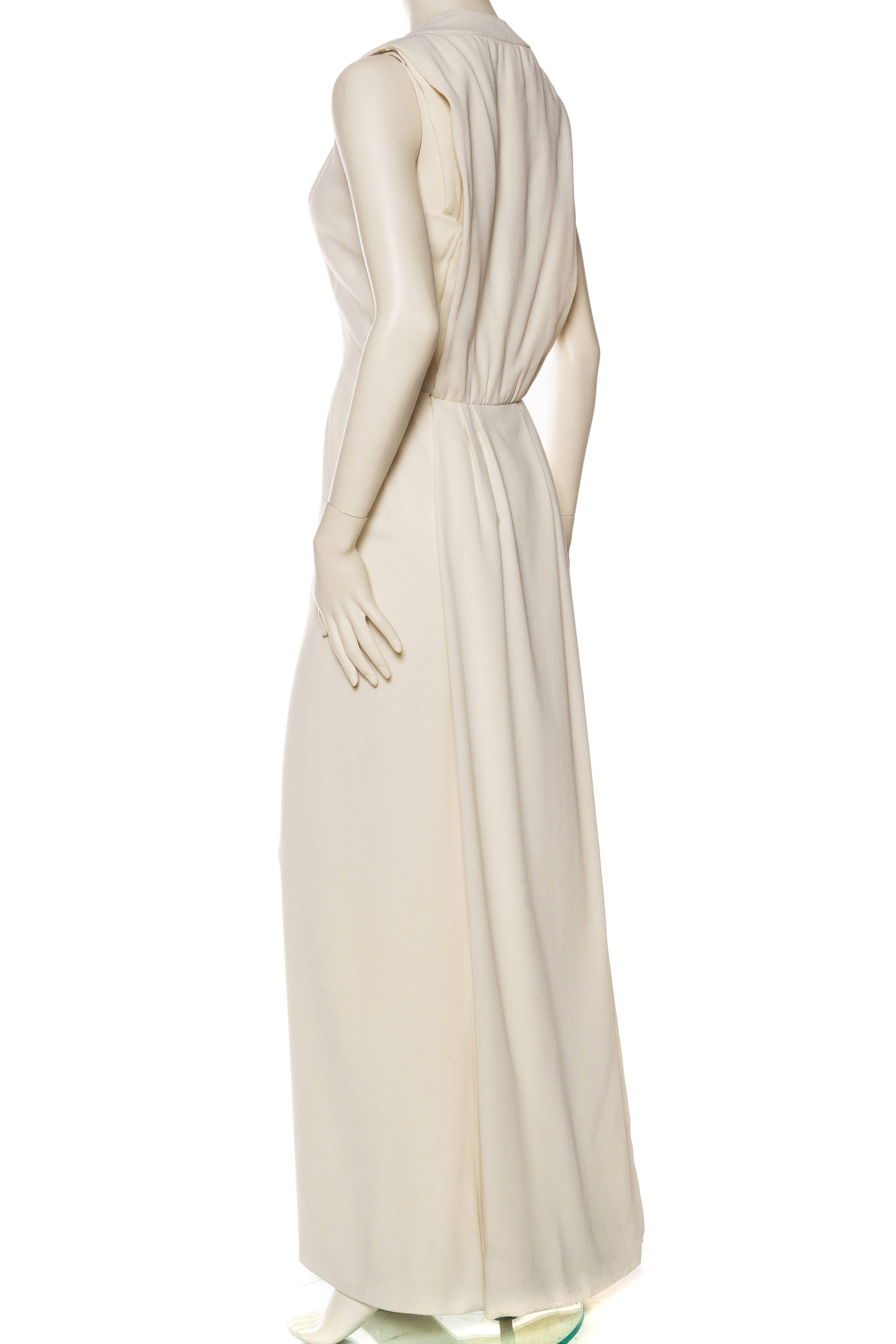 1960S PIERRE BALMAIN Off White Rayon & Silk Crepe Modernist Gown With Draped Ba In Excellent Condition For Sale In New York, NY