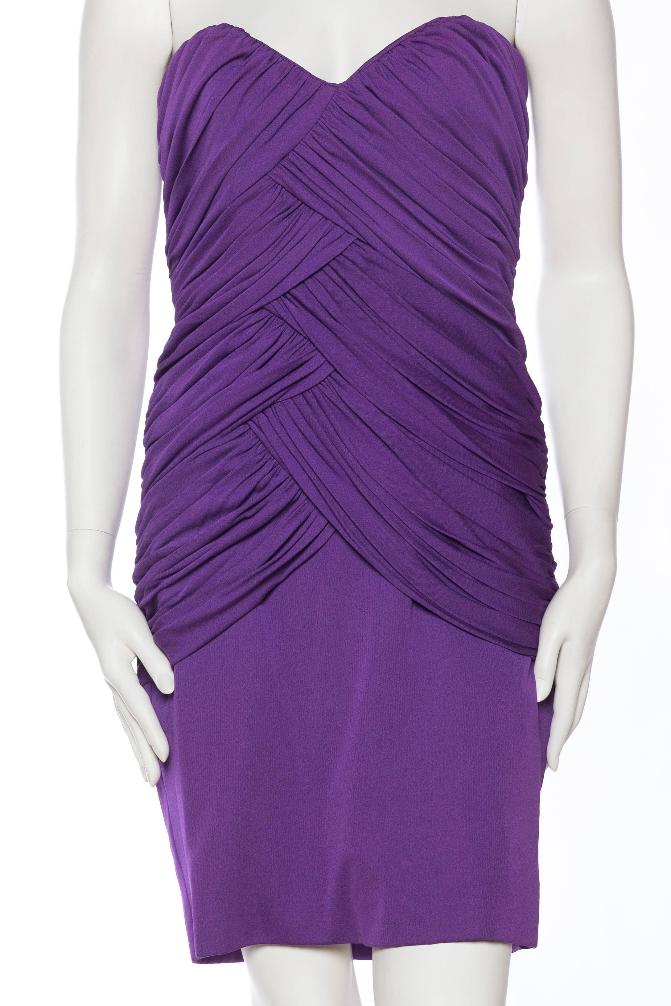 Built on a boned internal corset with a waist stay to keep the dress from riding down, fully lined. 1980S FABIAN MOLINA Purple Rayon Jersey Draped Strapless Cocktail Dress 