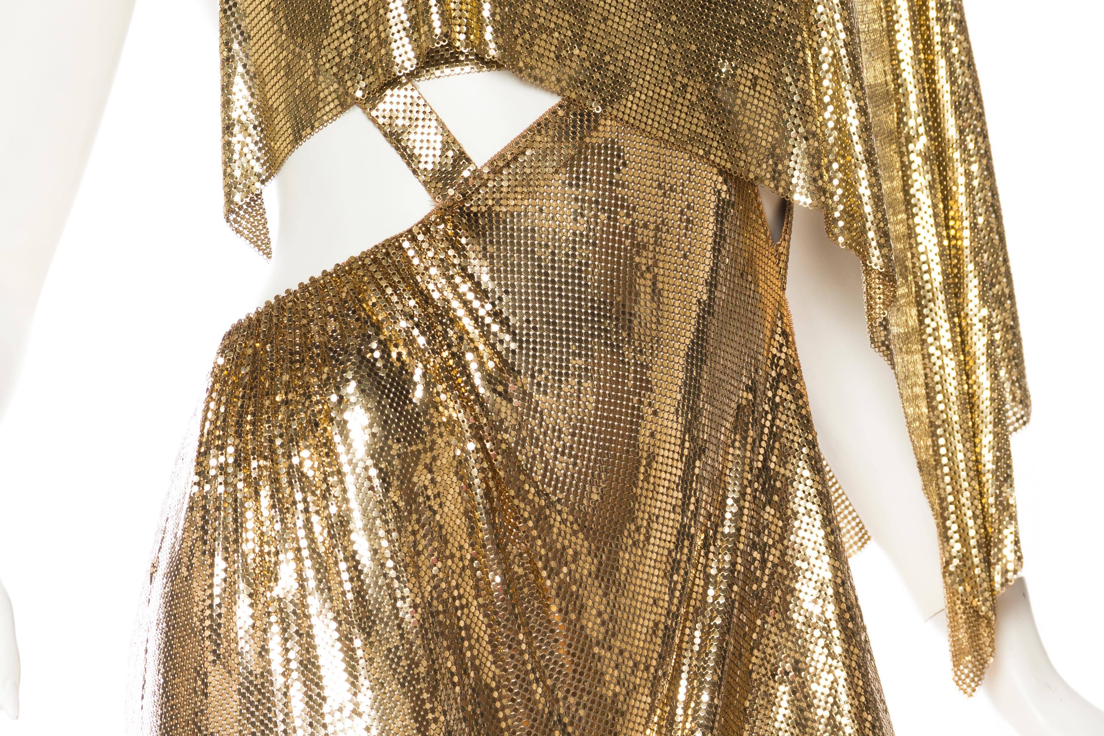 MORPHEW COLLECTION Style Gold Metal Mesh Backless One Sleeve Gown With High Slit In New Condition In New York, NY