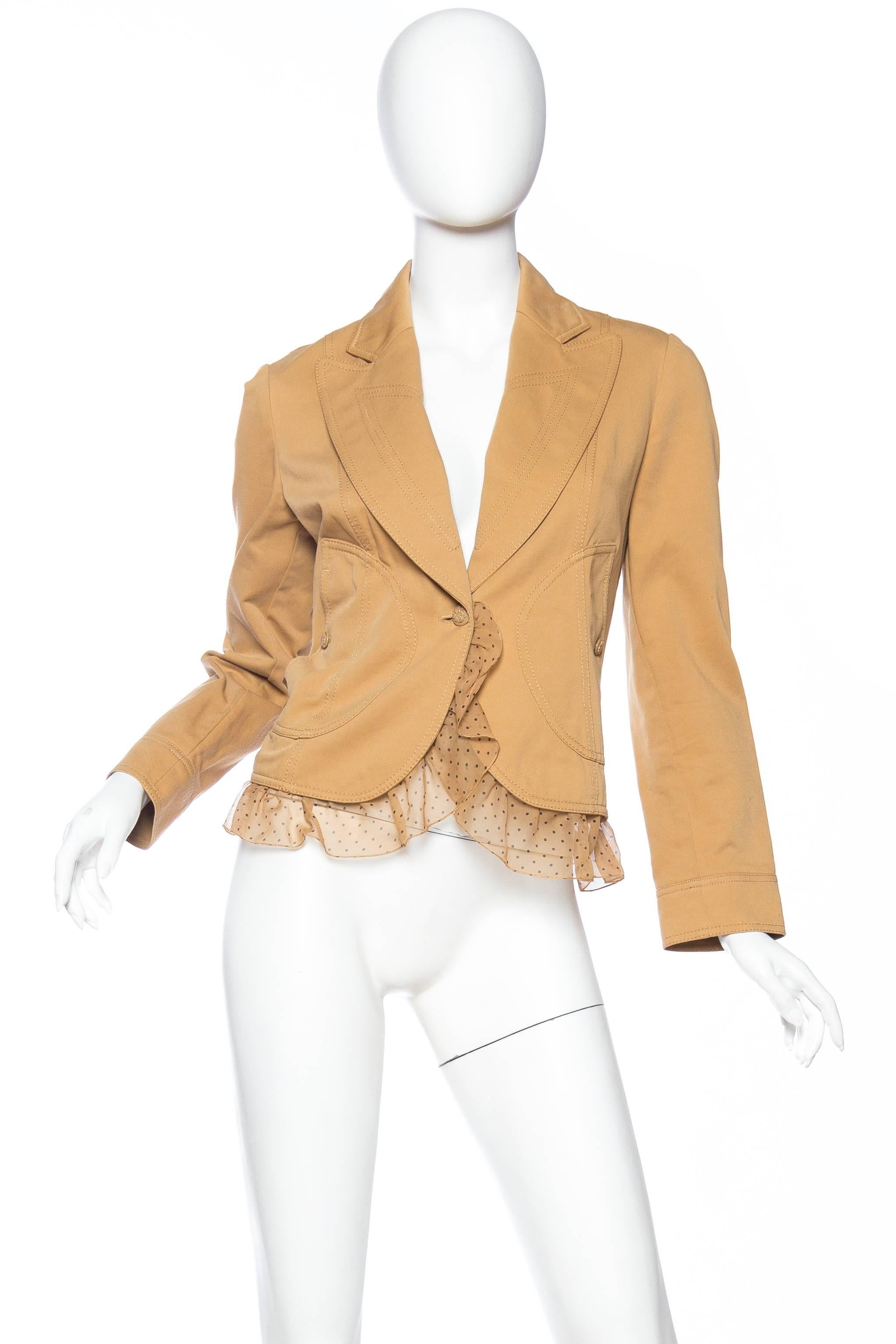 A great jacket to dress up a simple look with a touch of flirty romance.  Ruffle unbuttons from interior.