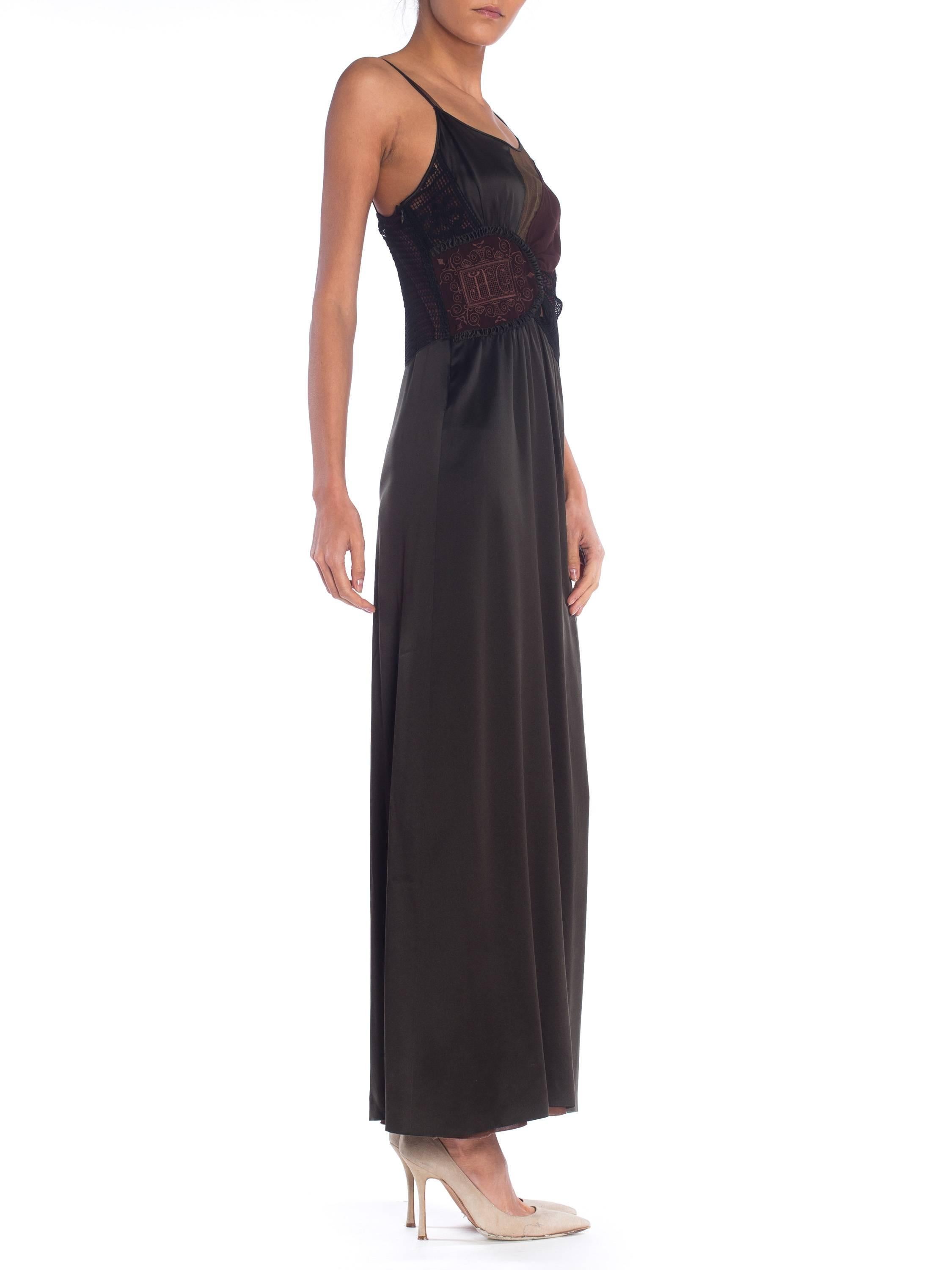 Dress has sheer and lace panels and comes with a slip