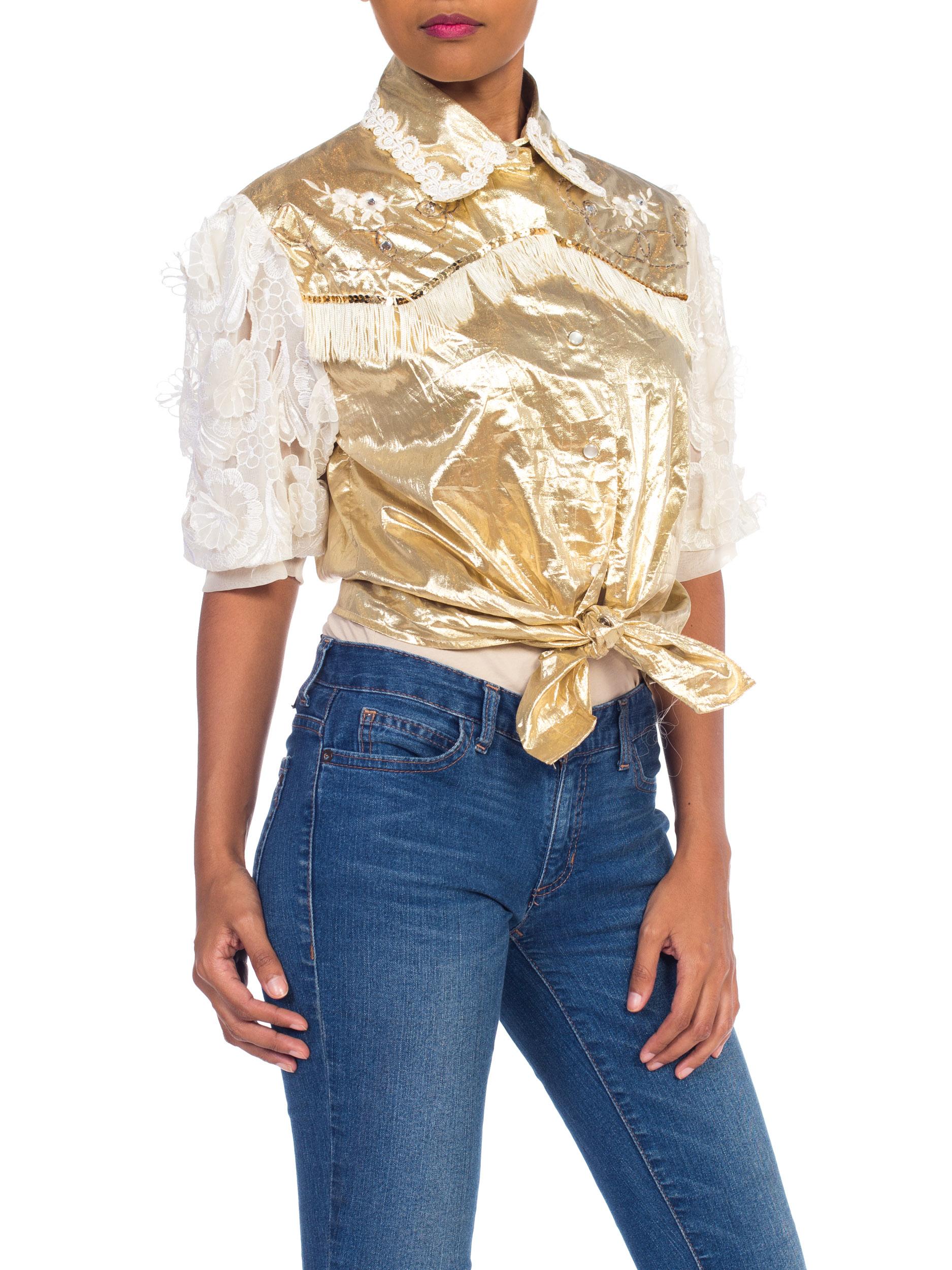 We made this from a vintage 1980s metallic gold lamé western shirt and jazzed it up a ton with fitting it and changing the sleeves with an awesome mod lace from the 1960s. A true one of a kind piece. 