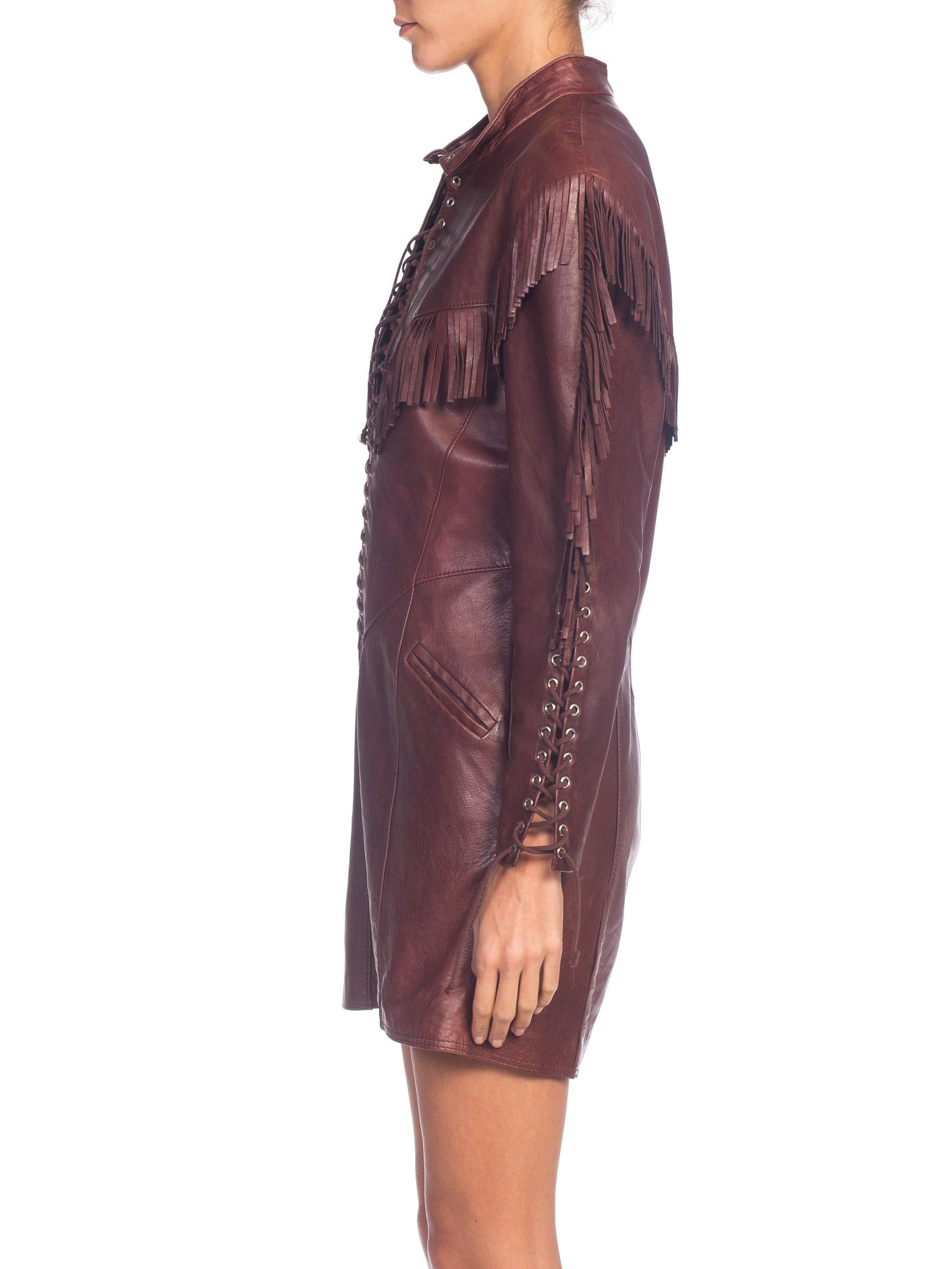 Buttery soft leather with a fitted cut in about a size 4-6, our model is a 2 and it is loose on her. 