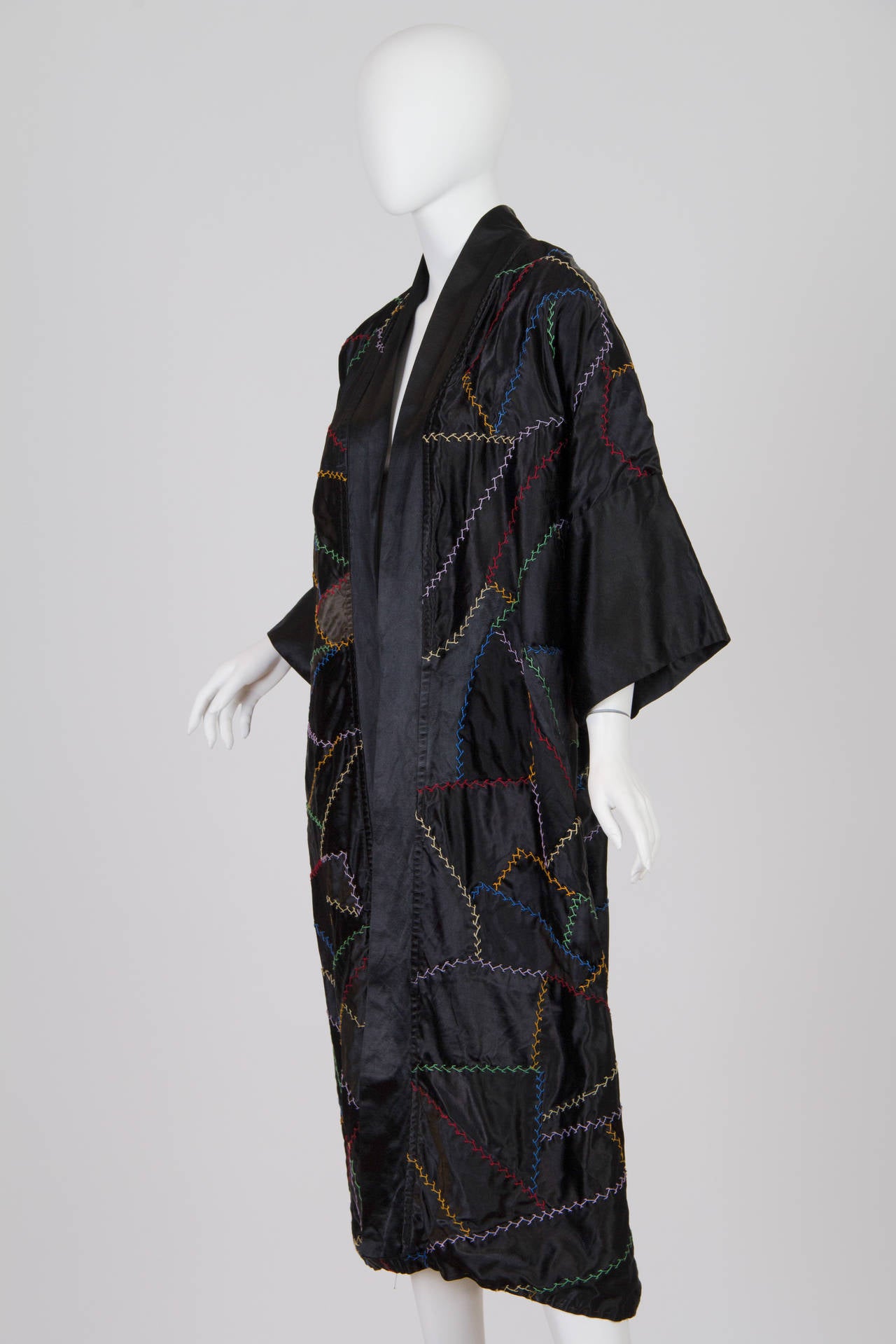 We have never seen a piece before from the 1920s in such phenomenal condition. The patchwork crazy quilt design may have been made of older textiles in its day but they are all in very strong and wearable condition. the lining is a fantastic strong