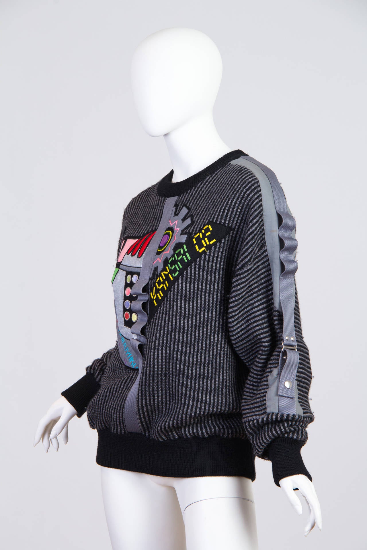 1980s computer graphics and pop motif applique sweater with pockets, straps and other assorted bells and whistles which mark this as a one and only Kansai Yammamoto original.