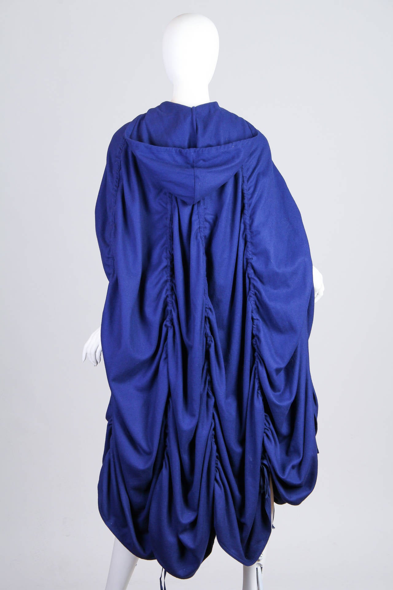 This is a sapphire-hued cape by Jean-Paul Gaultier's 