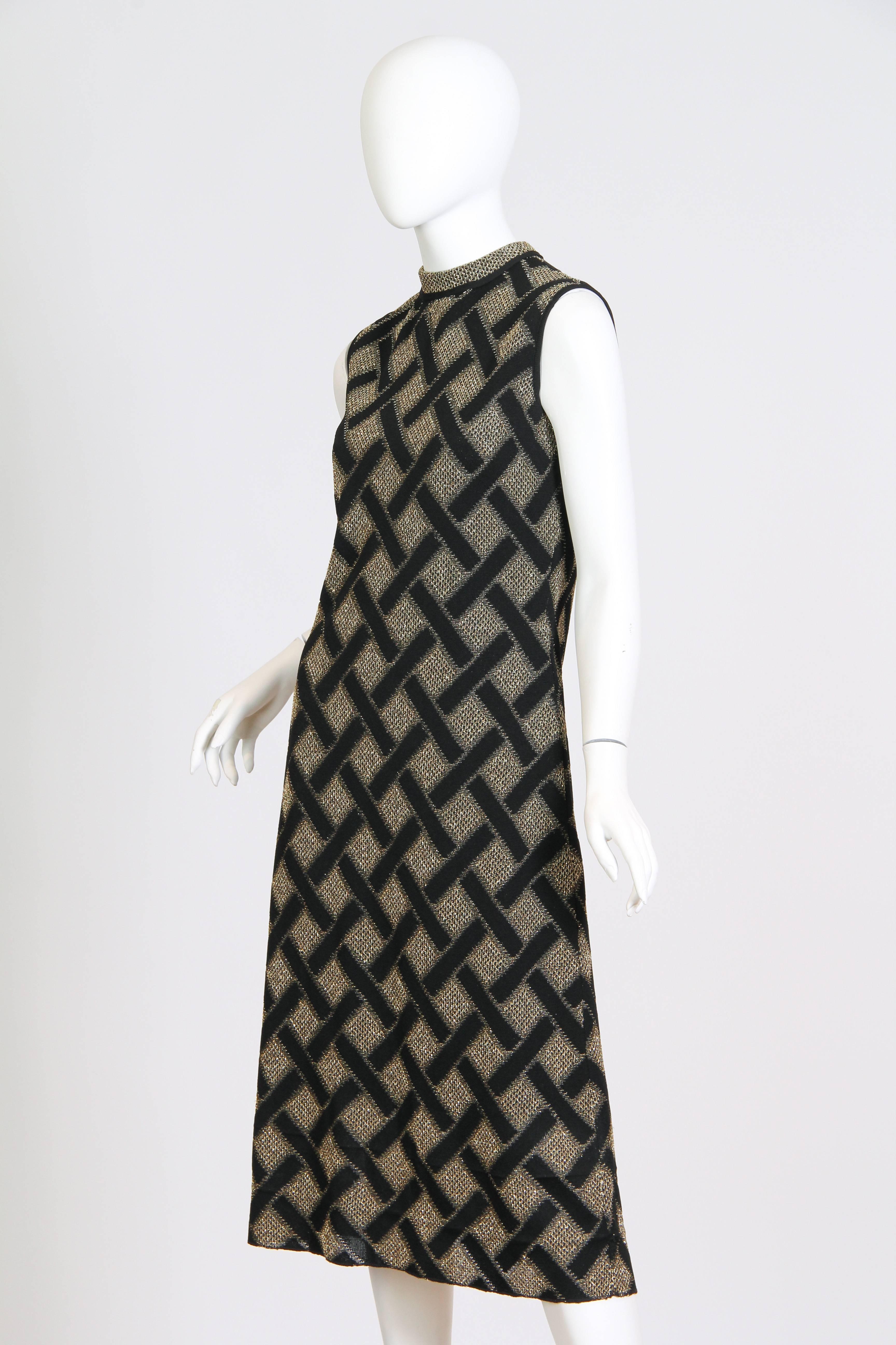 Pierre Balmain is a house known for luxury. In the 1960s and 1970s they also had an easier to wear knit line from which this comes. The dress is cut away from the body in a flatteringly almost mod line. The knit is a poly lurex blend which gives