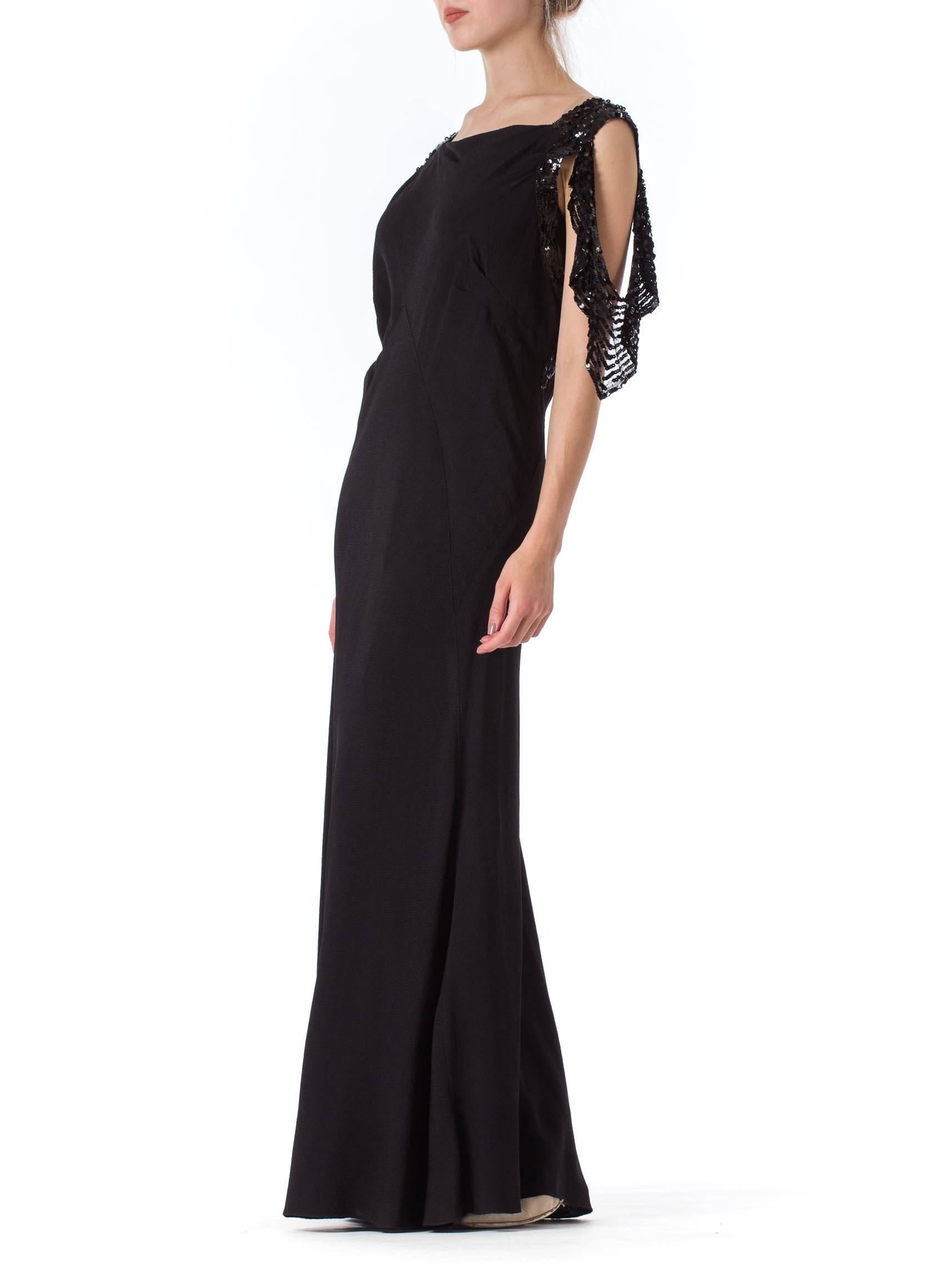 1930S Black Bias Cut Rayon Crepe Gown With Celluloid Sequin Peek-A-Boo Sleeves For Sale 1