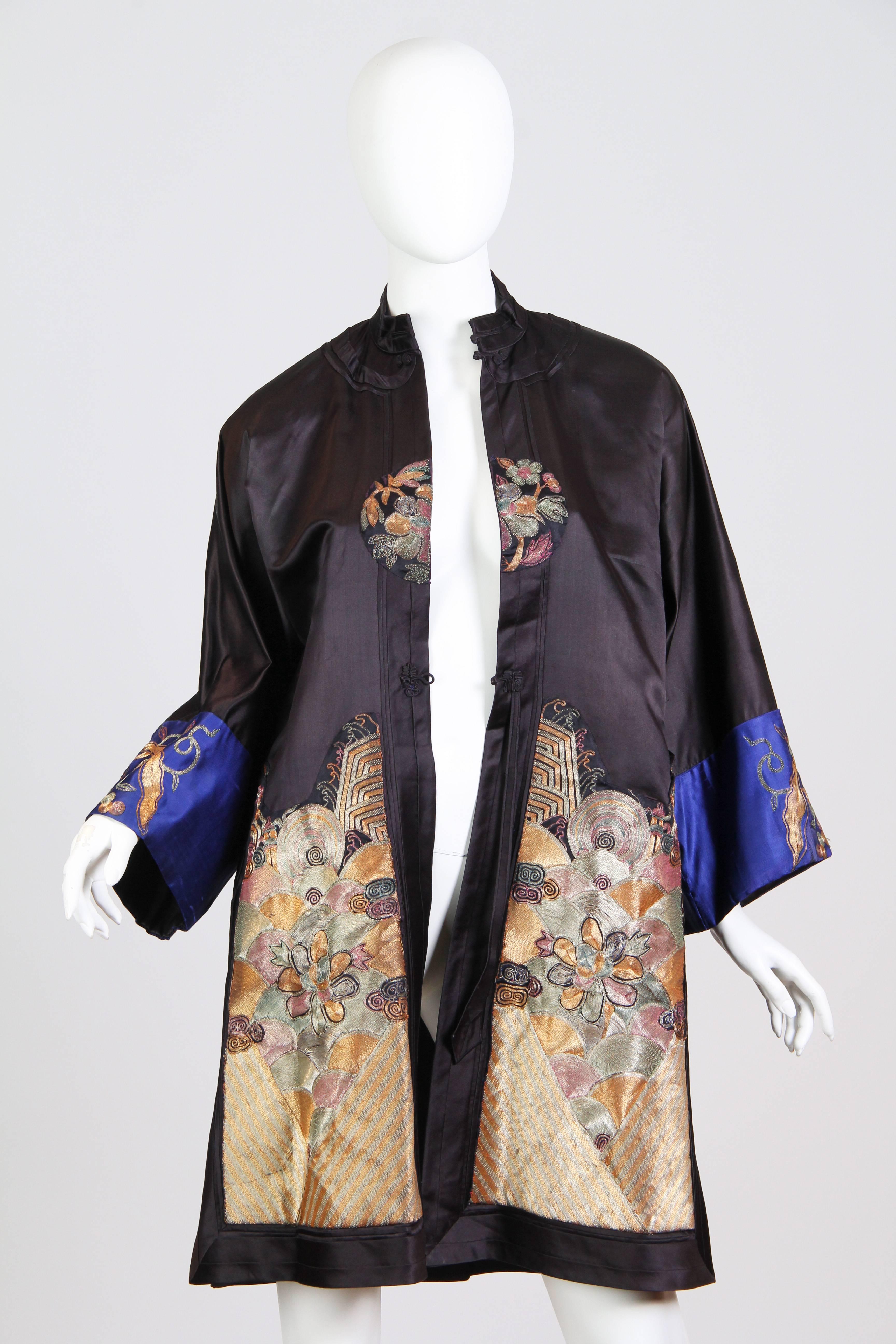 This is a beautiful hand-made jacket. Most likely made in China, this style of jacket was both a traditional garment and a popular import to Europe, where Asian clothing was all the rage for lounge- and boudoir-wear. The mixed geometric and floral