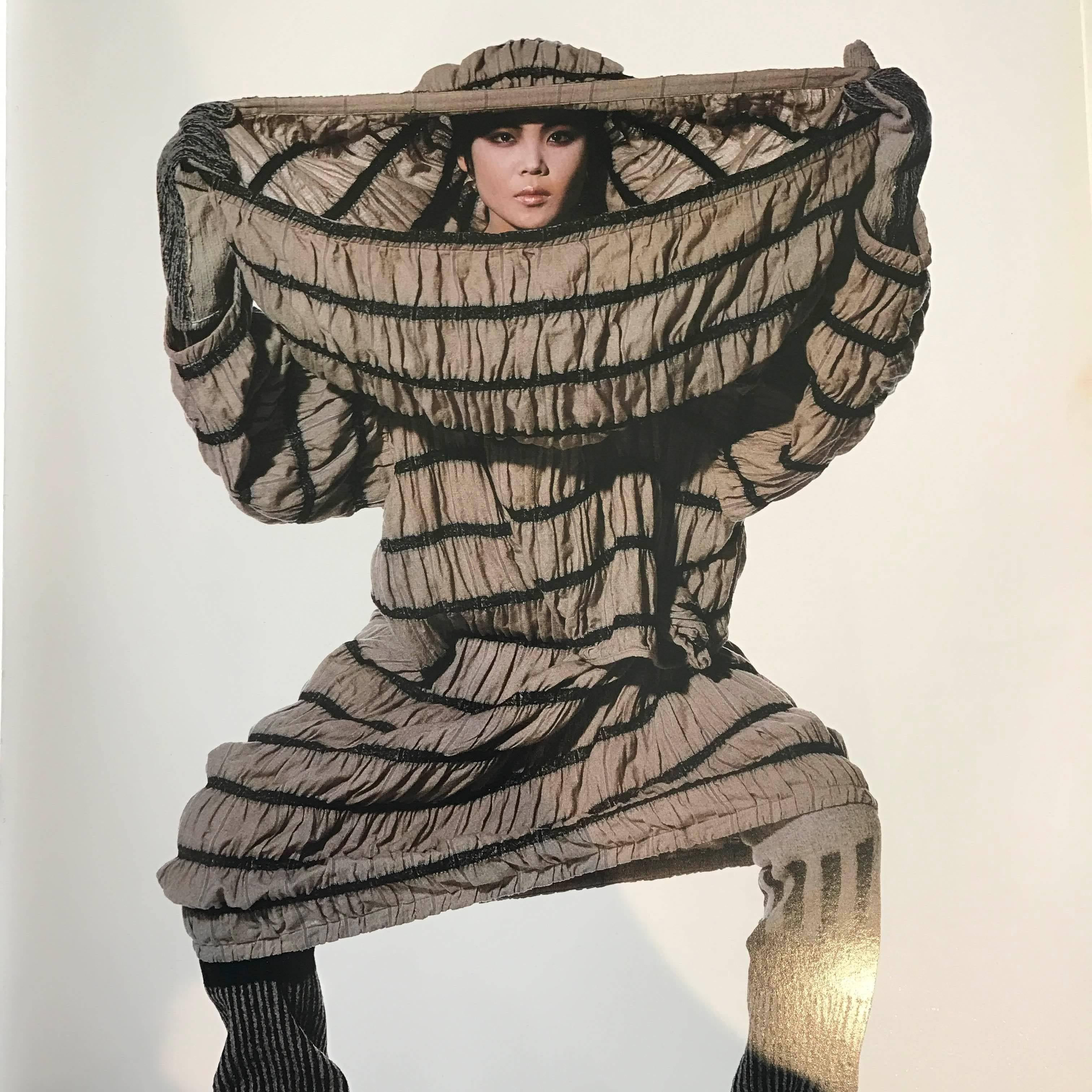 "Did you know there"s a tree in Africa where the bark comes off completely? It's round, just like a tube of jersey. I wanted to make something woven that was warped like African bark." Issey Miyake's own words about his inspiration