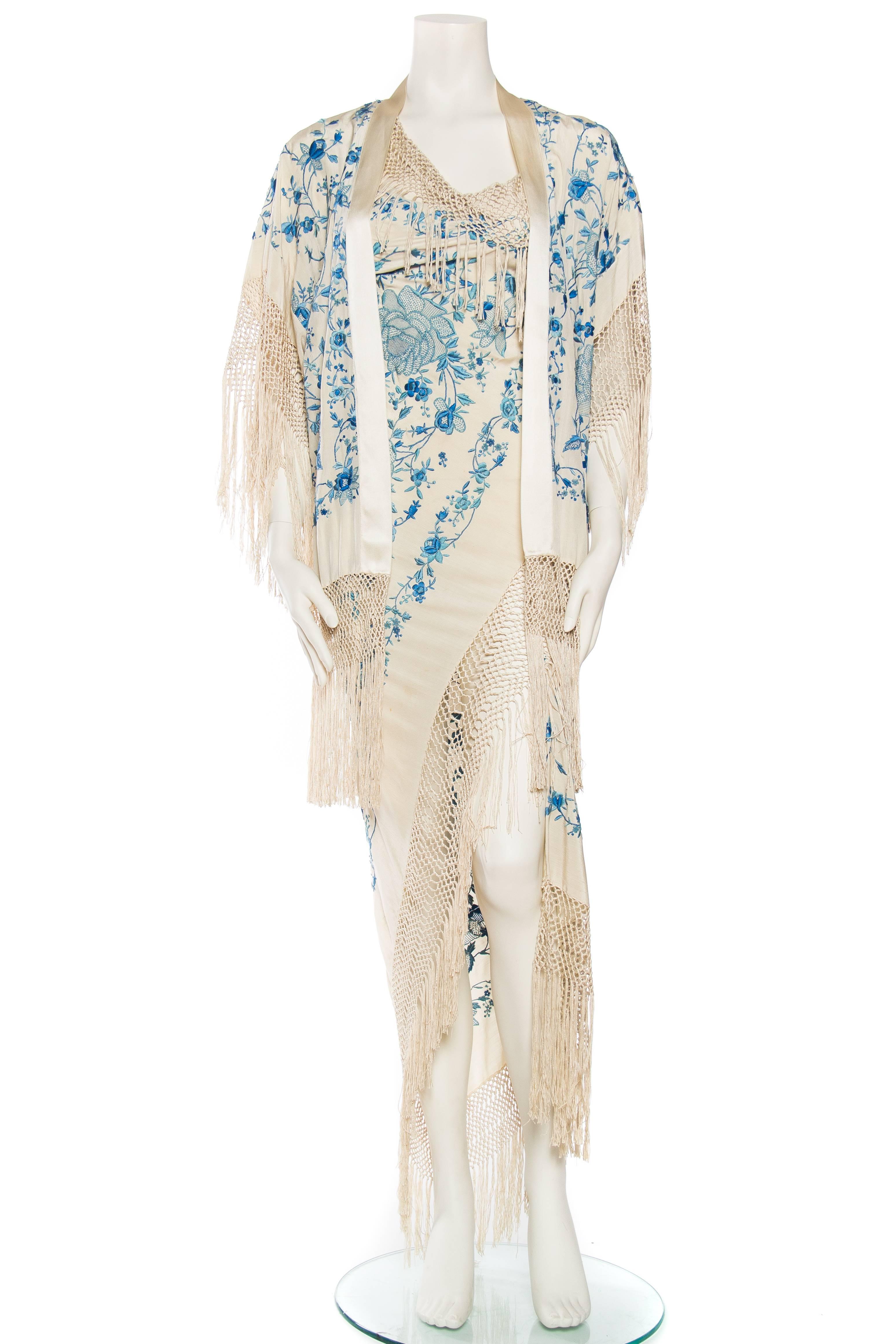 A hand embroidered chinese piano shawl from the 1920s has been used to create this sensual dress which clings to the body on the bias. Best suited for a size 2 it can go up or down a size but not for a tall woman as the hand knotted work by the
