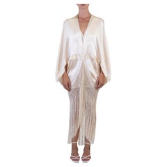 COLECCIÓN MORPHEW Capullo de charmeuse de seda champán con flecos