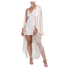 COLECCIÓN MORPHEW Capullo de charmeuse de seda champán con flecos