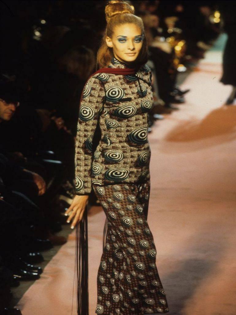 Phenomenal piece from Jean Paul Gaultier with an optical illusion pattern woven into the knit of this cozy jumpsuit. A chinese clasp at the mandarin neck is another nice JPG touch. 