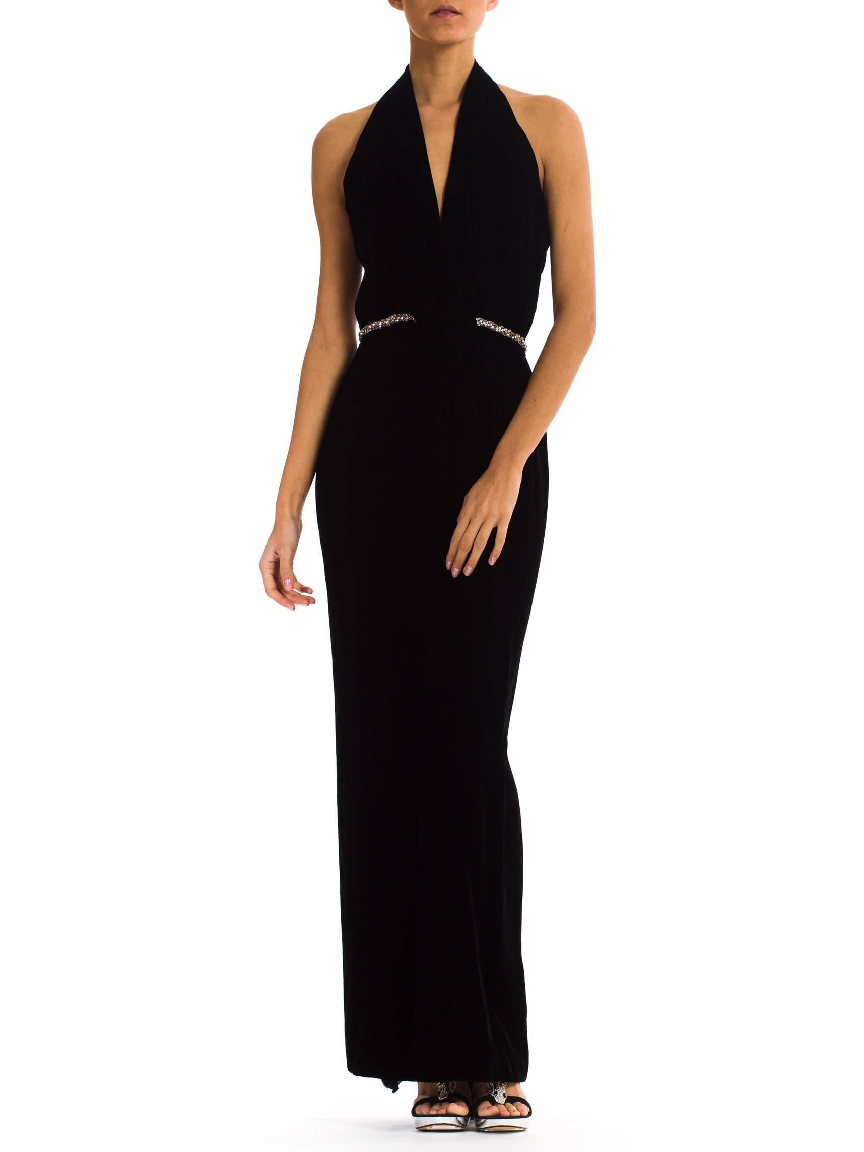 Please note that the rhinestone belt is not included with the dress. 1970S CEIL CHAPMAN Black Rayon & Silk Velvet Plunging Halter Neck Gown With Slight Train 