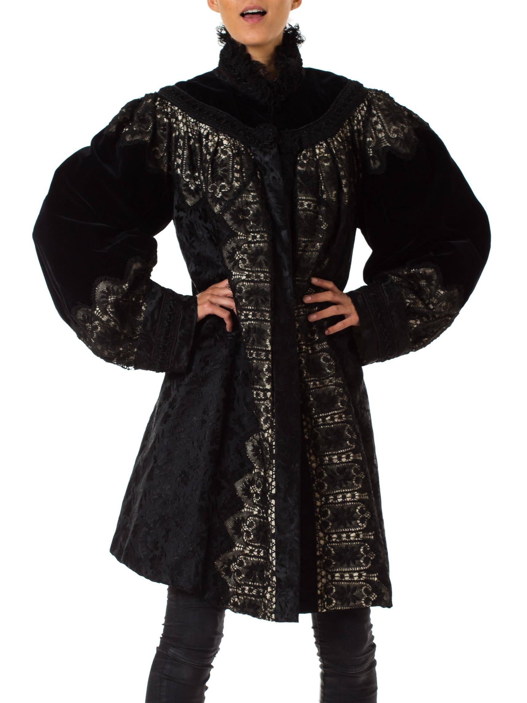 This incredible piece is an evening coat from between about 1895 and 1905, and resembles closely the finest museum examples designed by the likes of Charles Worth. With a generous body of silk brocade, a yoke and sleeves of rich velvet, and insets