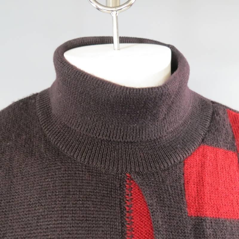 This unique vintage ISSEY MIYAKE sweater comes in a deep eggplant purple and red wool and features a turtleneck, four pattern stripe and checkered color block front, one red sleeve, one purple sleeve, frontal slit pleats, and a color block back.