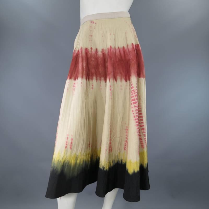 This rare and gorgeous circle skirt by PRADA comes in a beautiful wrinkle textured silk, and features a elastic waist waistband with hook eye closure, full circle skirt silhouette, and unique striped tie dye technique with accents of red, yellow,