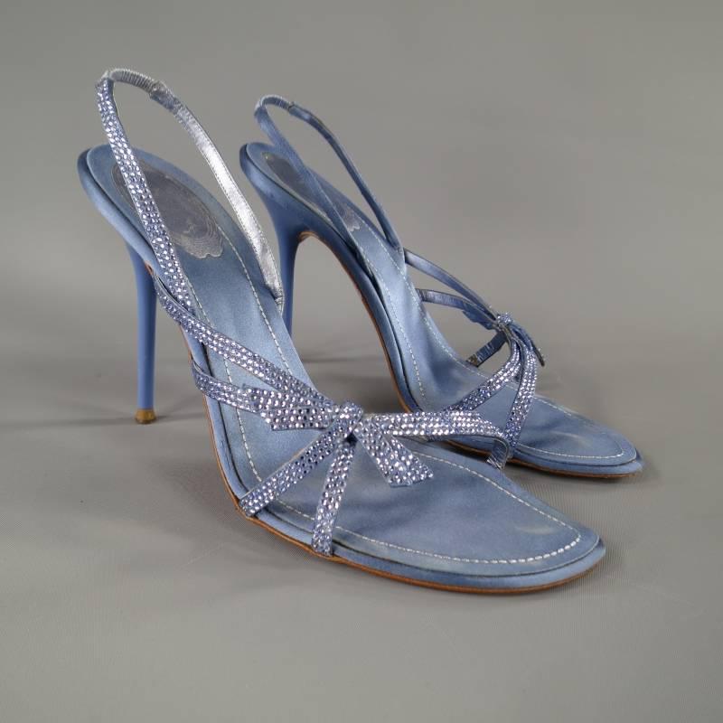 These fabulous RENE CAOVILLA sandals come in a gorgeous light blue silk and feature inter locking Swarovski crystal studded straps with bow detail, stretch sling back, and glossy stiletto heel. Made in Italy. with Box.

Excellent pre-Owned