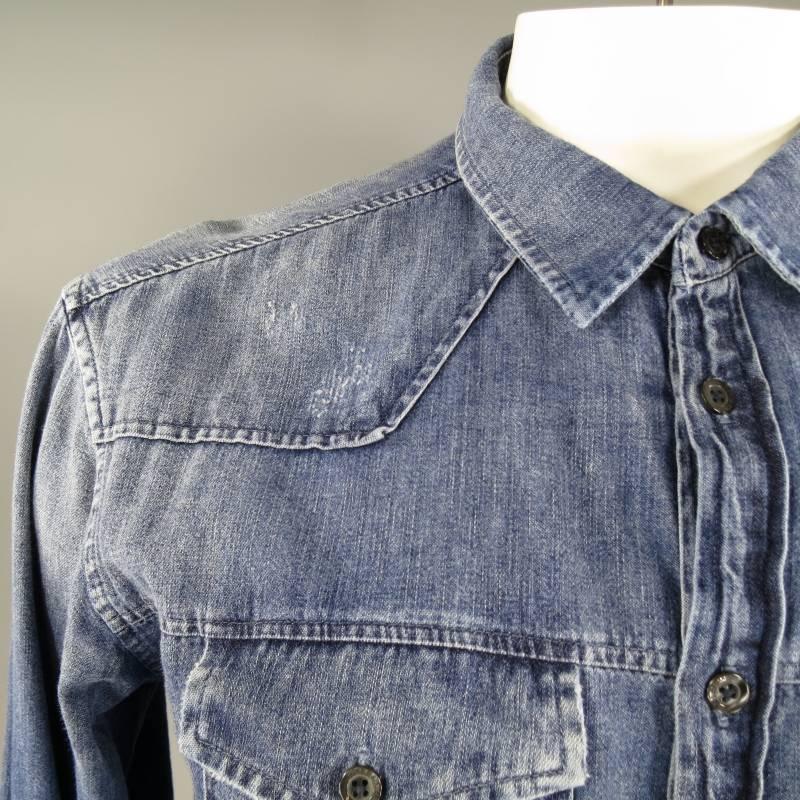 PIERRE BALMAIN denim long sleeve button-down features two breast pockets, artful distressing throughout and an Oxford hem in medium wash indigo, Made in Italy.
 
Excellent Pre-Owned Condition
 
Measurements:
 
Shoulder: 21 in.
Chest: 42