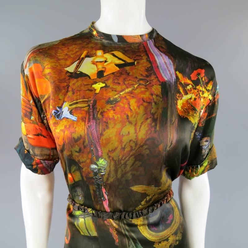This fabulous HUSSEIN CHALAYAN dress comes in a gorgeous all over painted art graphic print silk satin and features a crew neck, cuffed, short sleeves, T-shirt silhouette, and elastic waist belt that can be removed by seamstress for a shift