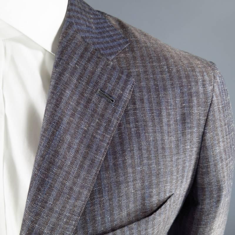 KITON Sport Coat consists of cashmere blend material in a brown and blue color tone. Designed in a stripe pattern throughout body of coat, notch lapel collar, pocket square and bottom patch pockets. 4-button cuffs, half constructed with double back