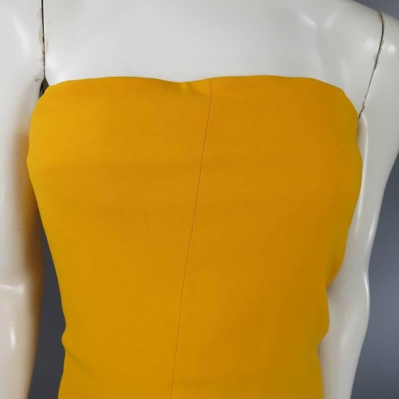 REED KRAKOFF blended cotton dress features tulip construction with asymmetrical seam down the length of the dress, enclosed back zip, interior bustier support with sheer lining throughout in goldenrod yellow.
 
Excellent Pre-Owned Condition   