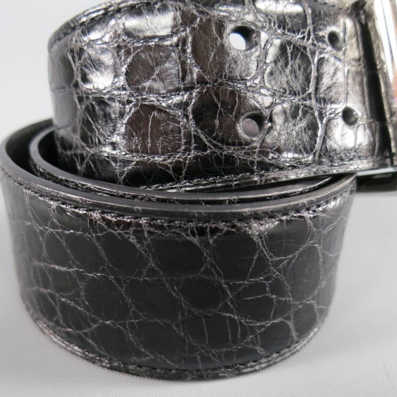 This gorgeous RALPH LAUREN COLLECTION belt comes in black alligator leather and features a silver tone, logo engraved, double prong buckle. Made in Italy.
 
Excellent Pre-Owned Condition.     Marked: S
 
Measurements:
 
Length: 30 - 34