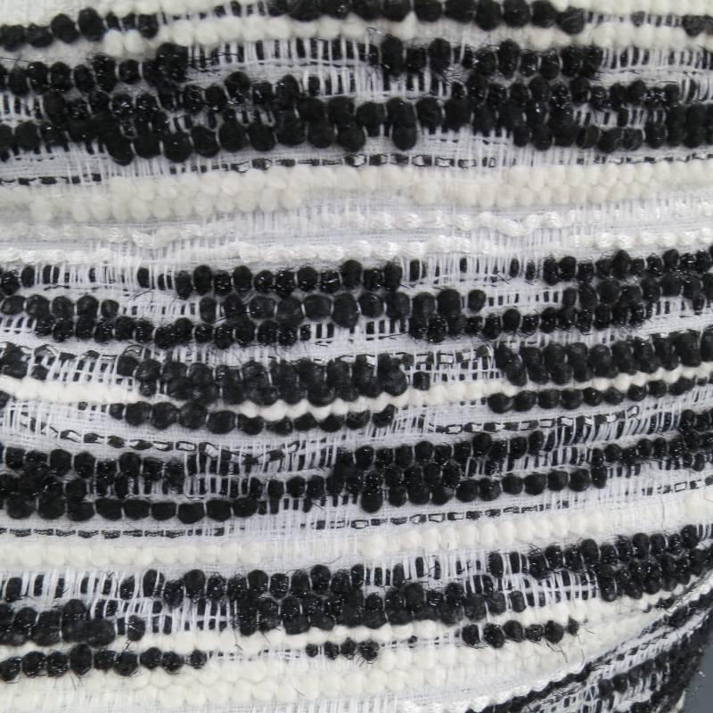 This fabulous PROENZA SCHOULER mini skirt comes in a black and white striped boucle tweed and features a high rise with black leather waist band and chain details. Made in USA.
 
Excellent Pre-owned Condition.      Marked: 4
 
Measurements:
